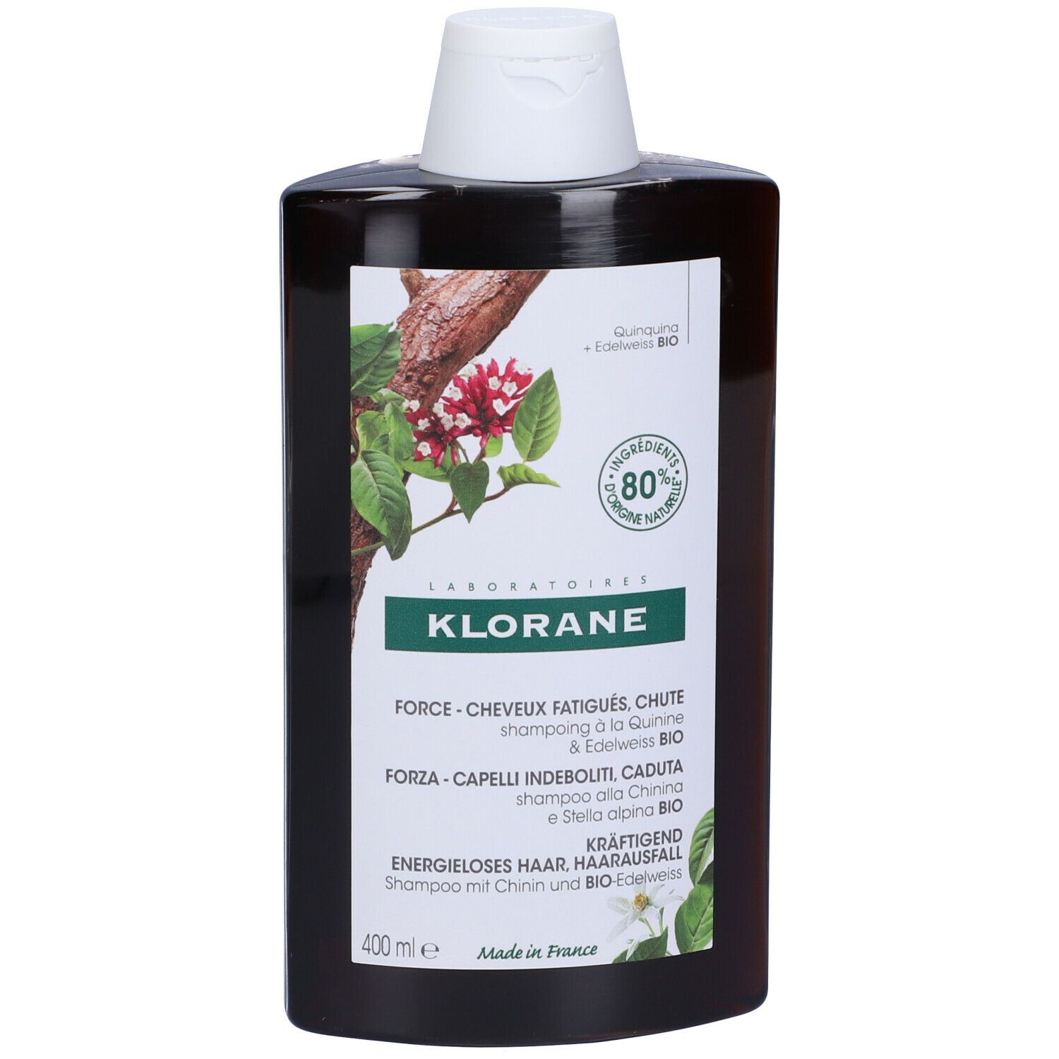 Flacone shampoo Klorane. Marrone, tappo bianco. Etichetta con informazioni e logo.