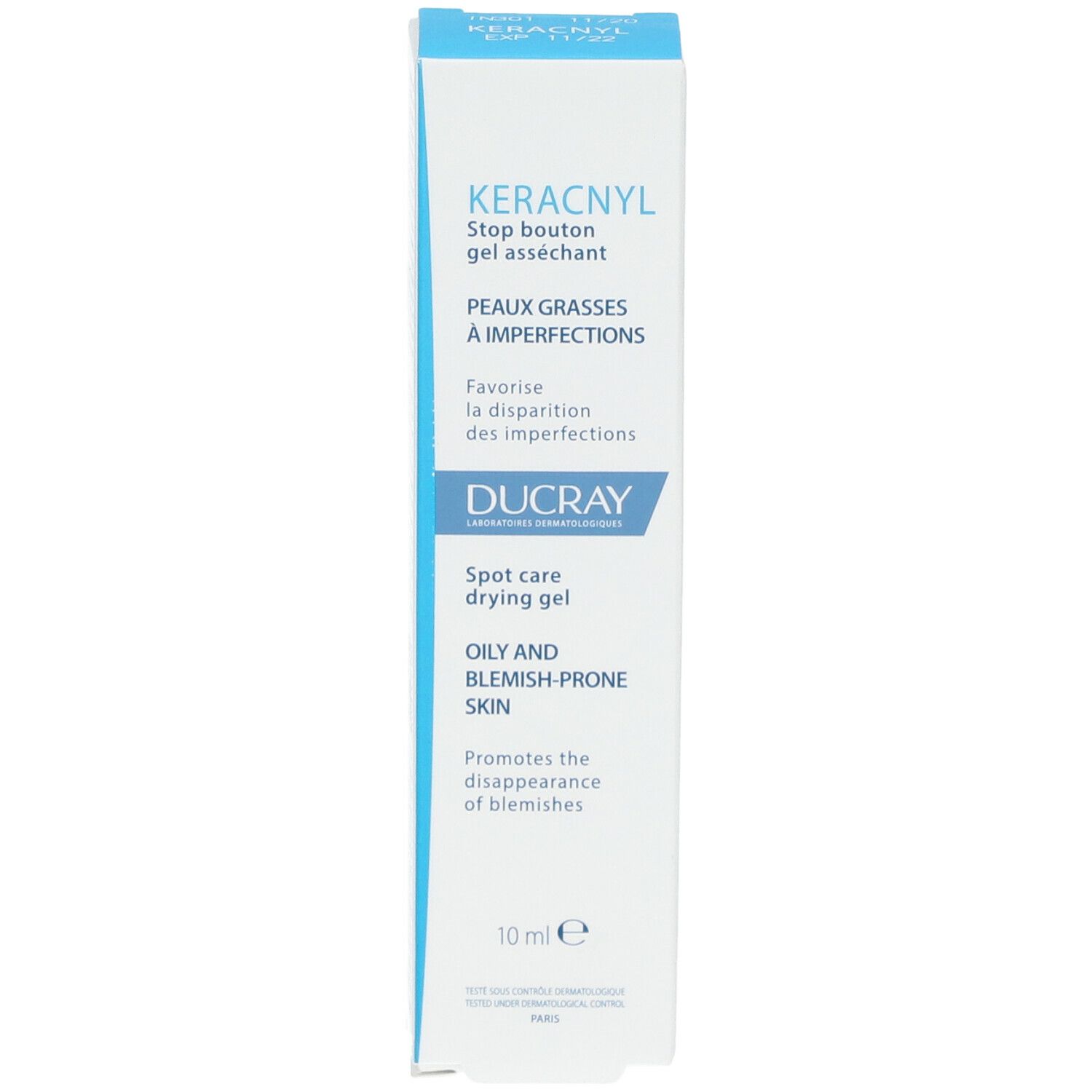 Scatola con testo: KERACNYL, Stop bouton gel asséchant, Ducray, Spot care drying gel, 10ml. Blu e bianco.