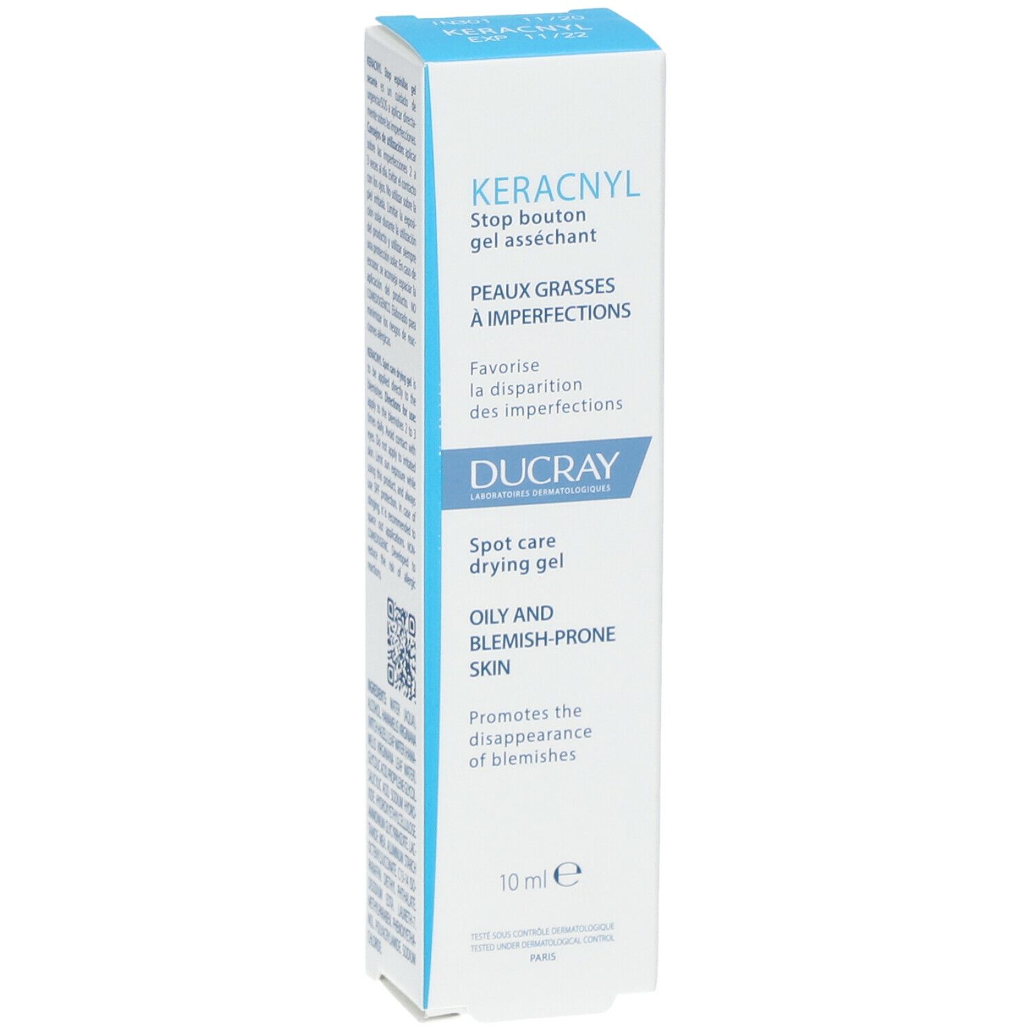 Scatola con testo: KERACNYL, Stop bouton gel asséchant, Ducray, Spot care drying gel, 10ml. Blu e bianco.