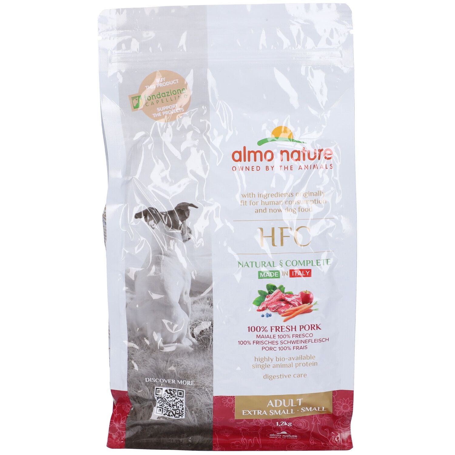 Sacchetto di cibo per cani Almo Nature HFC. Scritte: HFC, 100% maiale fresco, Adult, Extra Small, Small. Immagine di un cane.