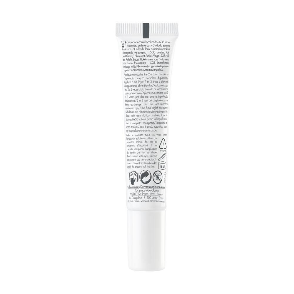 Retro del tubo bianco. Testo multilingue. Informazioni su ingredienti, uso e avvertenze.