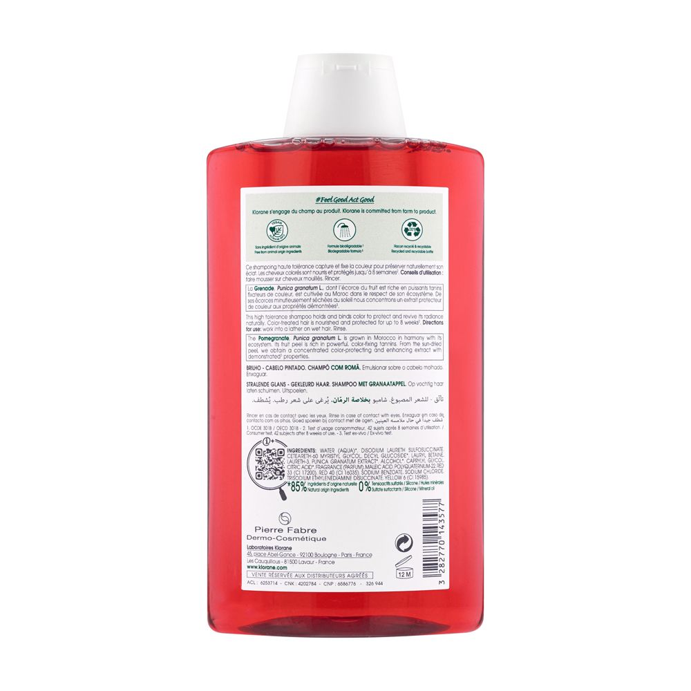 Retro del flacone di shampoo rosso. Testo e codice QR. Informazioni sugli ingredienti e il riciclo.
