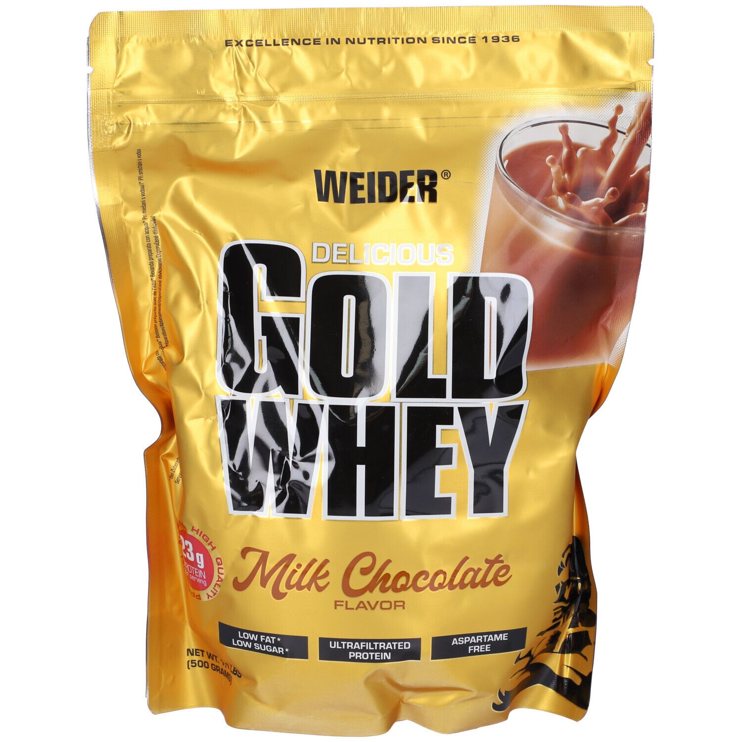Confezione di Gold Whey Milk Chocolate Flavour. Confezione dorata con nome e immagine del prodotto. 23g di proteine.