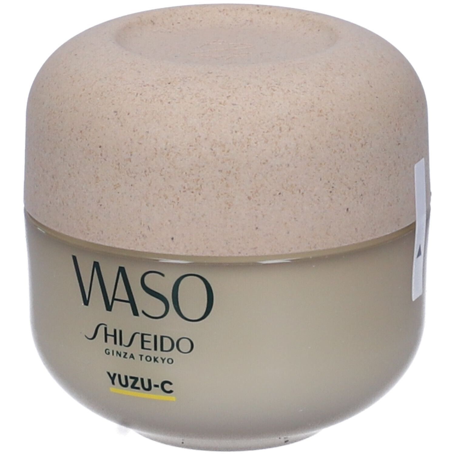 Contenitore color crema, coperchio beige. Scritta WASO, SHISEIDO, YUZU-C. Striscia gialla.