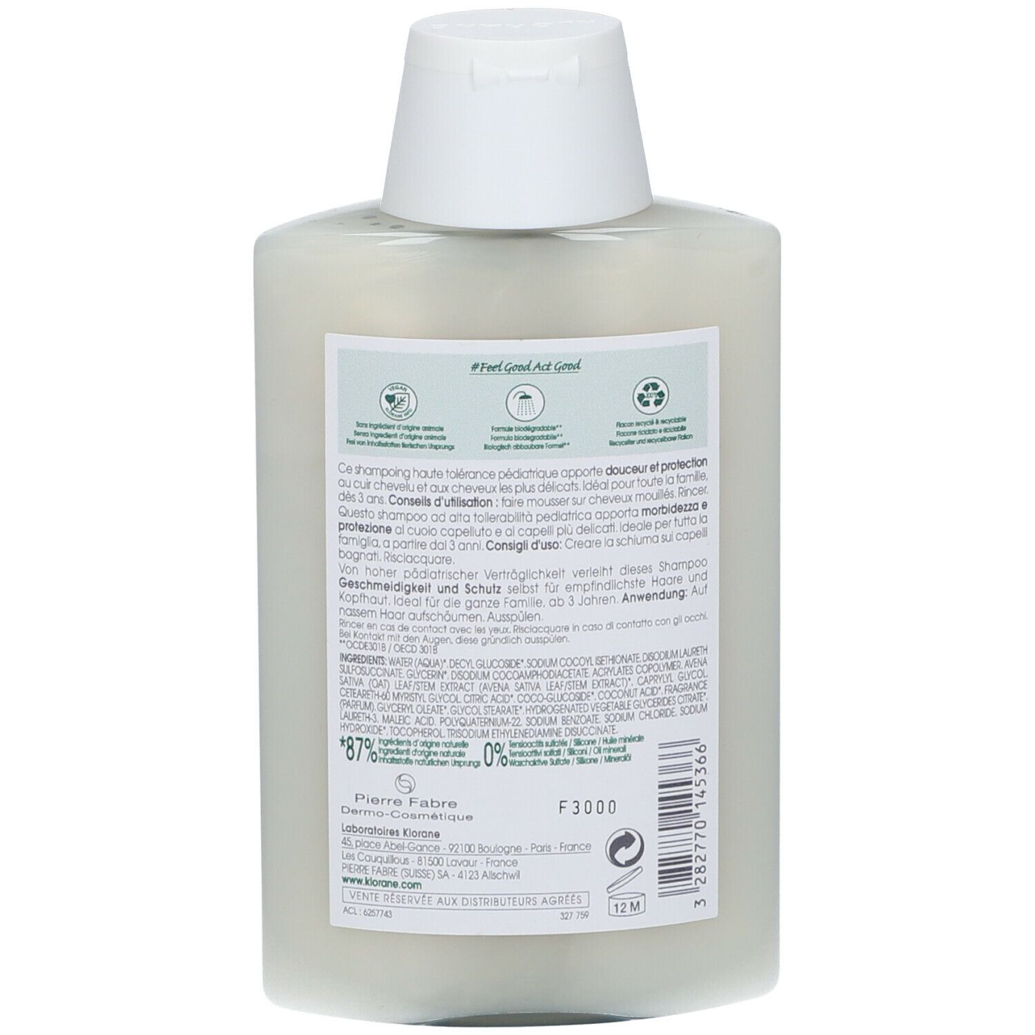 Retro del flacone di shampoo. Testo in più lingue. Informazioni sull'uso e gli ingredienti.