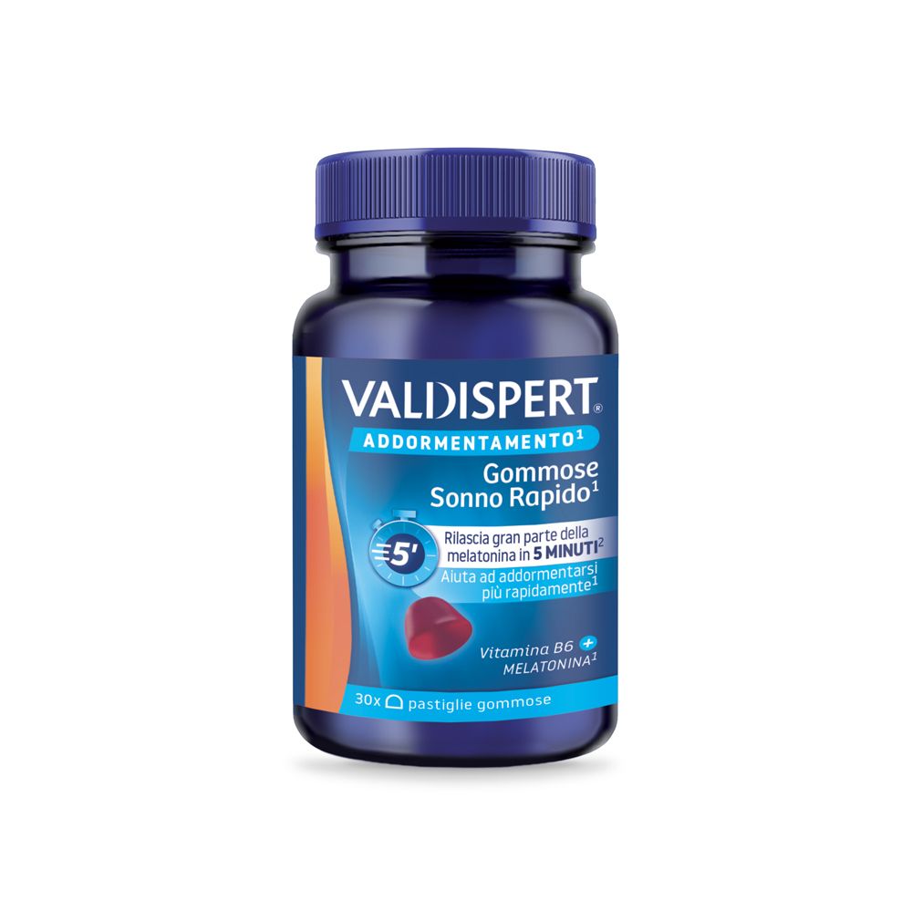Flacone blu VALDISPERT® Gommose Sonno Rapido. Contiene melatonina e vitamina B6. 30 pastiglie gommose. Forma di caramelle rosse.