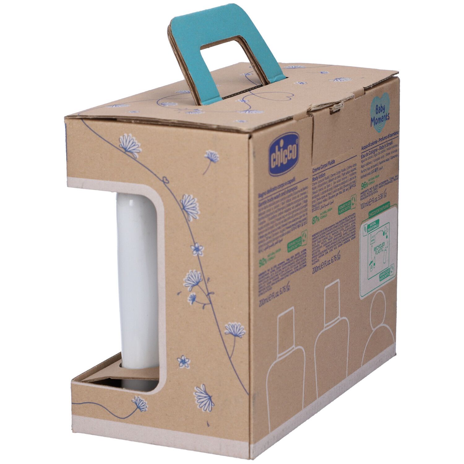 Vista della confezione regalo con prodotti per la cura del bambino. Visibile solo la lozione per il corpo. Con finestra.
