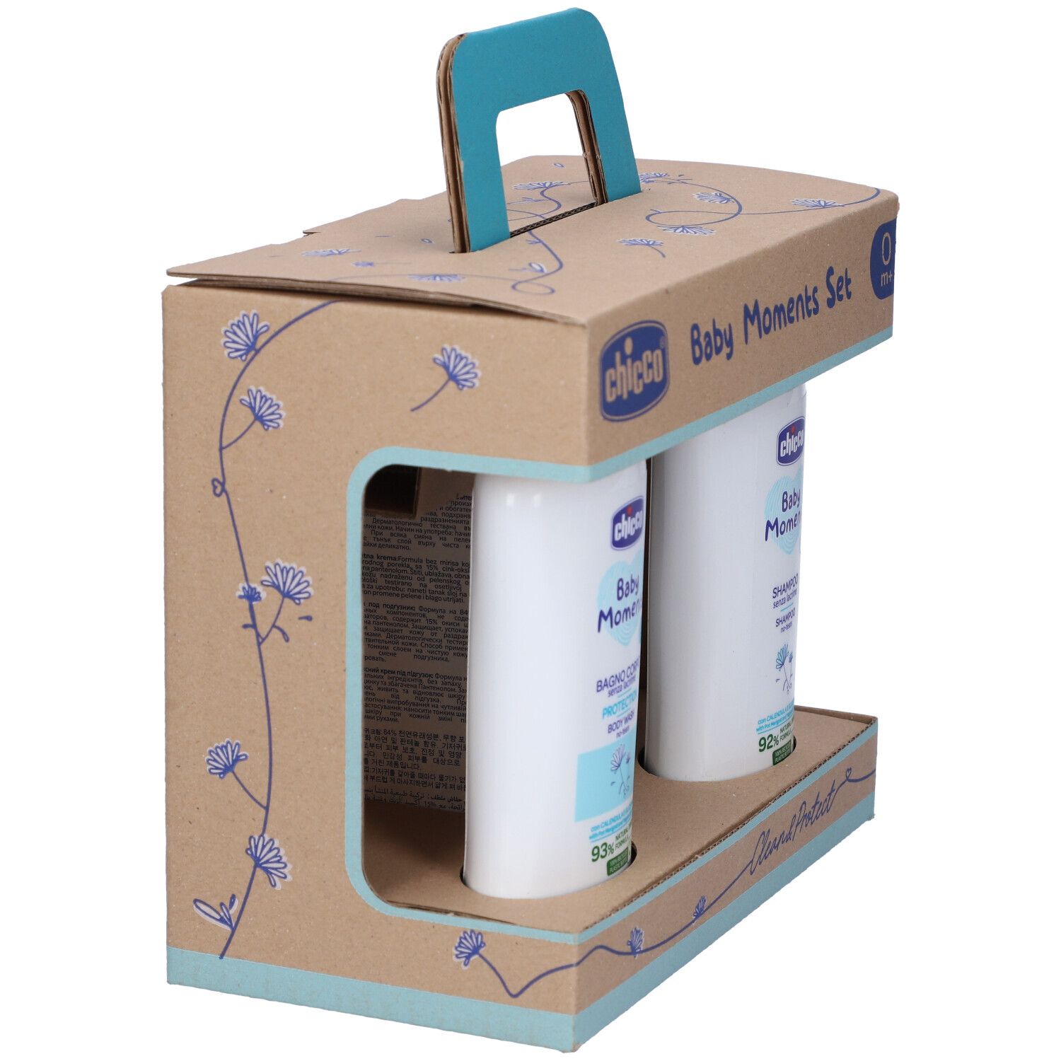 Set regalo con prodotti per bambini. Contiene due flaconi e un tubetto in una scatola di cartone con manico. Scritte: Baby Moments, 0m+.