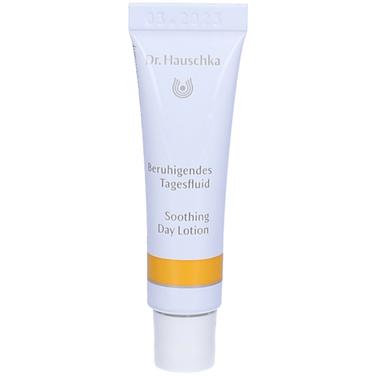 Tubo bianco-giallo con 'Beruhigendes Tagesfluid' e 'Soothing Day Lotion'.