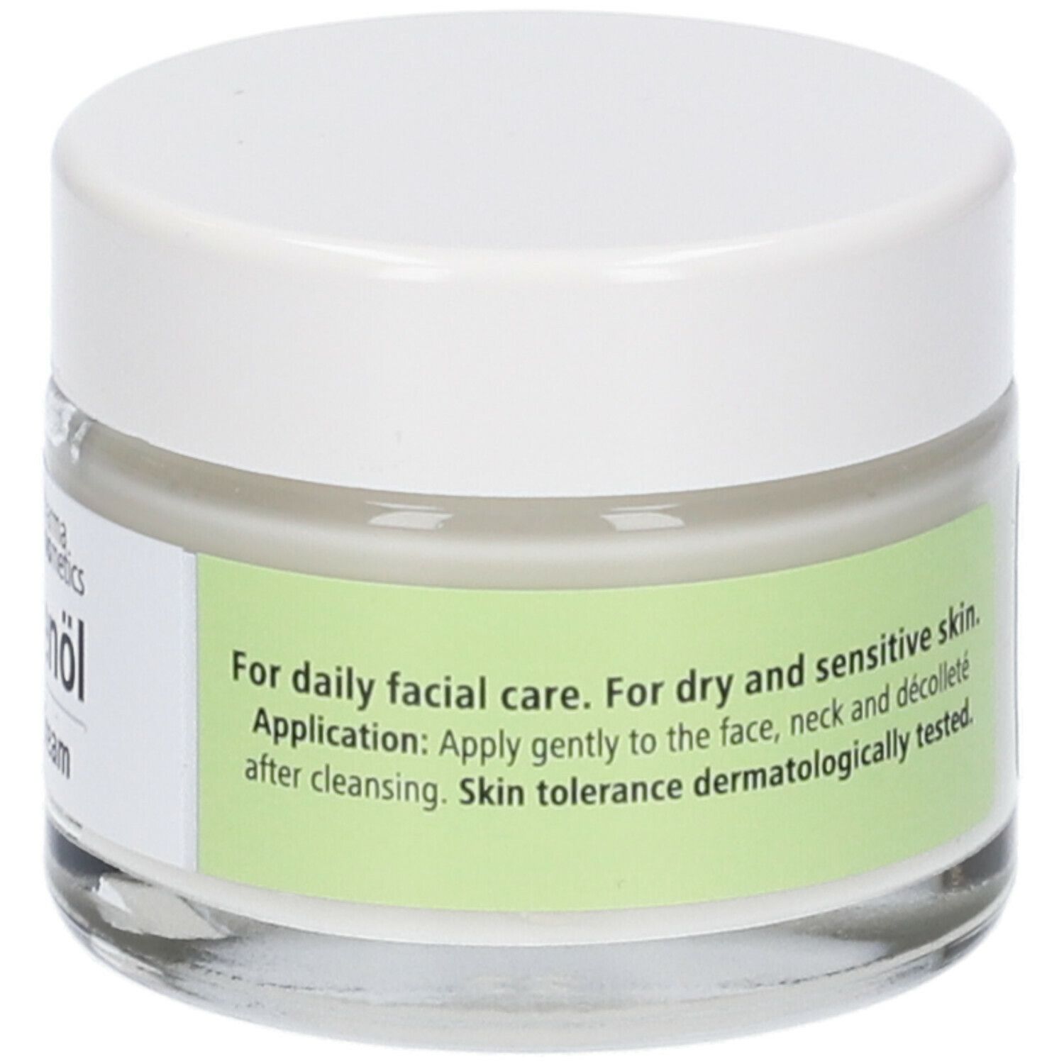 Crema viso Medipharma Olivenöl. Vasetto in vetro con coperchio bianco. Istruzioni per l'uso e test dermatologico.