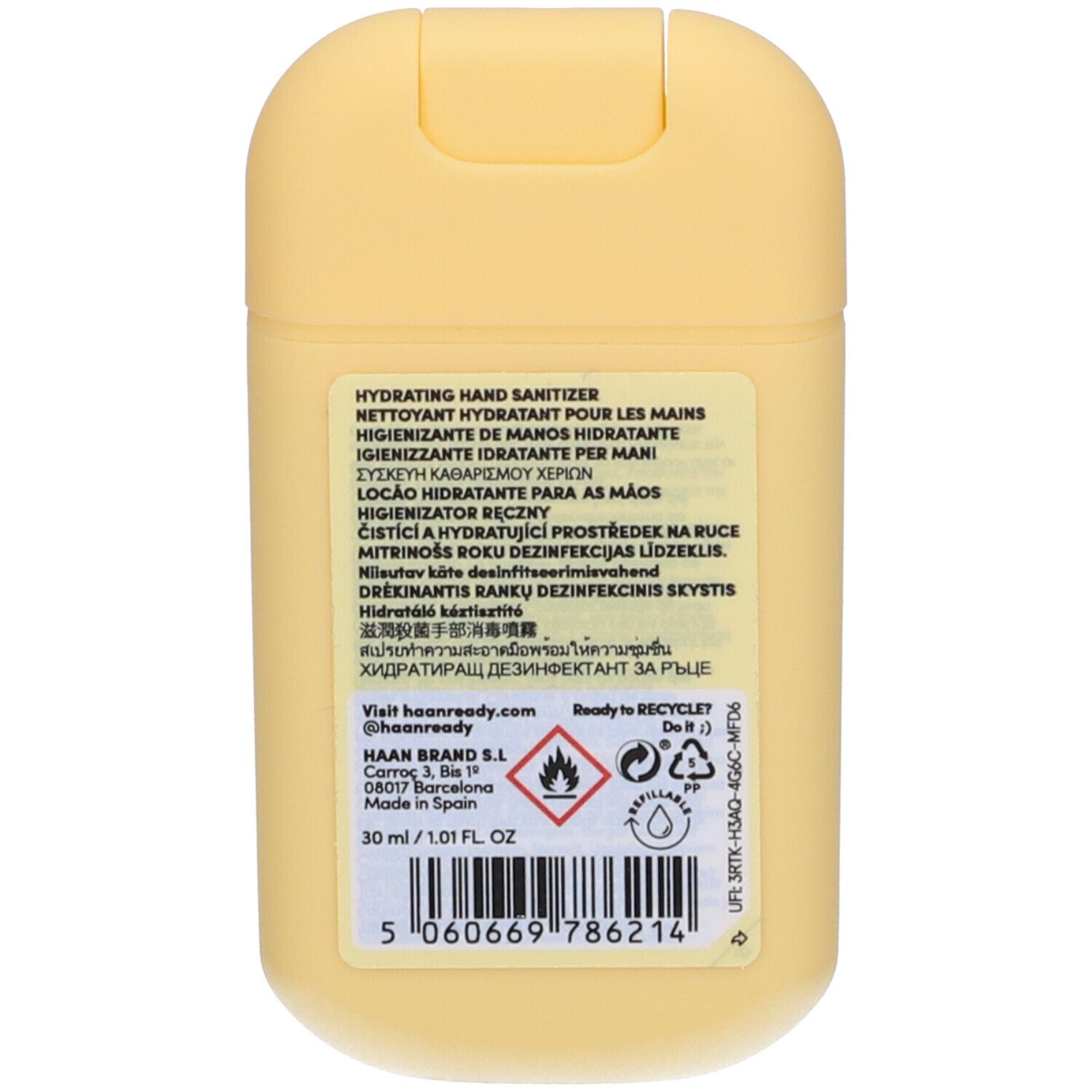 Retro del disinfettante per mani giallo. Testo multilingue.