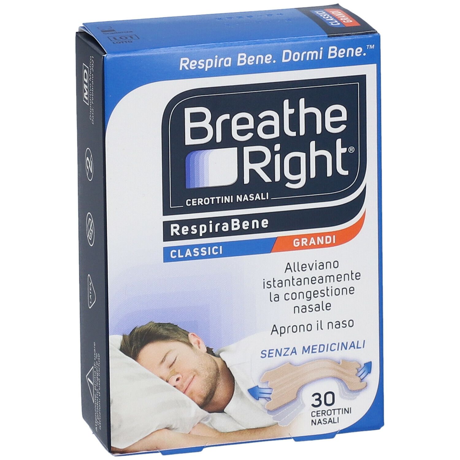 Scatola blu e bianca Breathe Right. Scritto RespiraBene Classici Grandi. Immagine di uomo che dorme. Contiene 30 cerottini nasali.