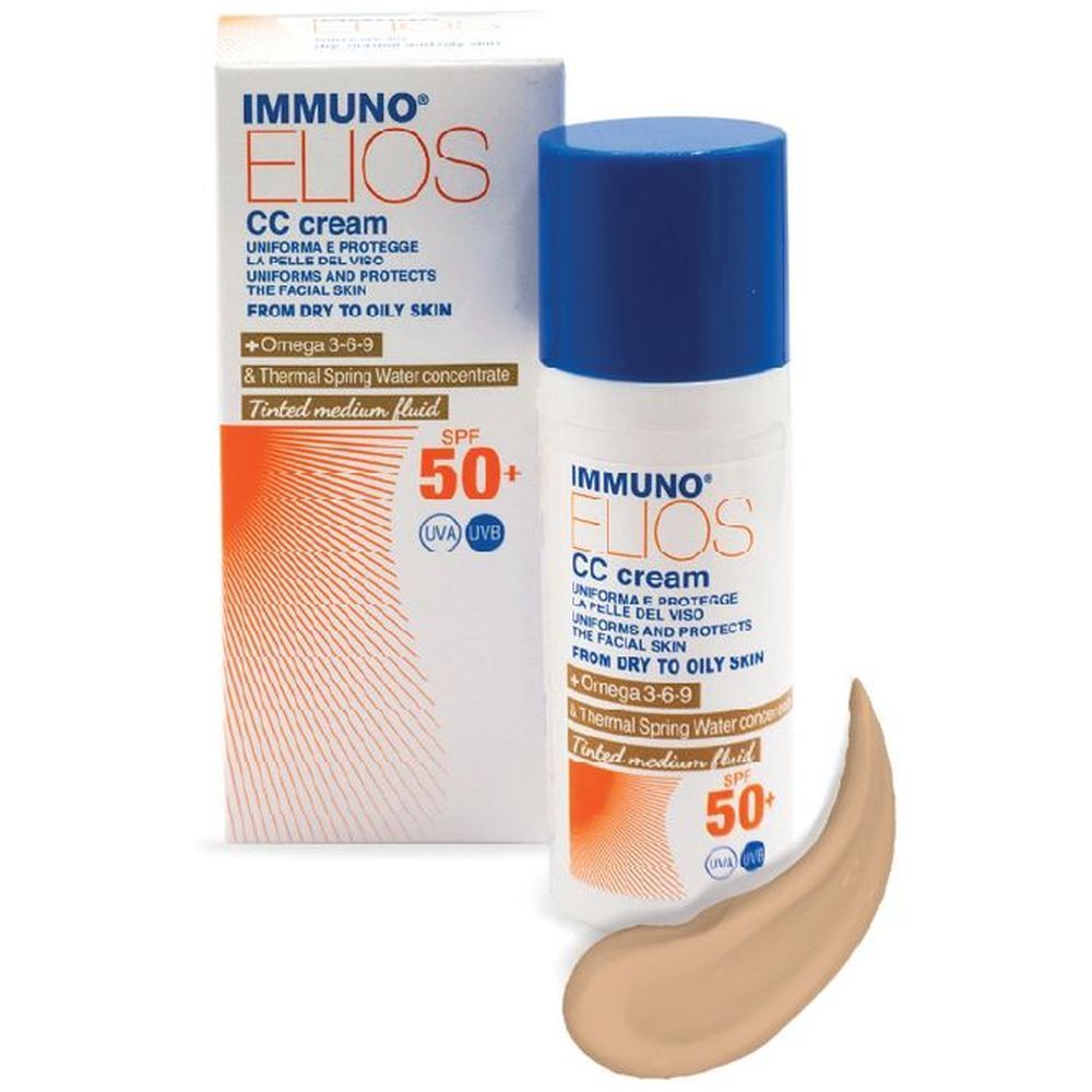Tubo e confezione crema. Scritta: Immuno Elios CC cream, SPF 50+. Fluido medio colorato.
