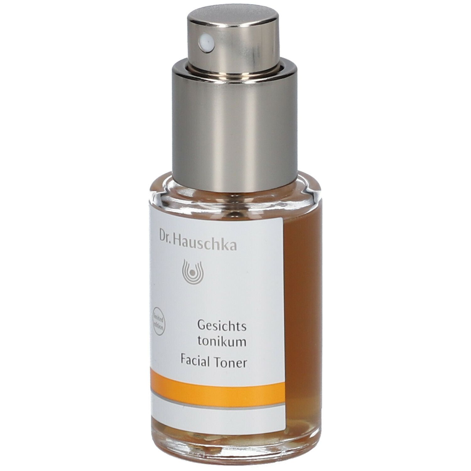 Flacone in vetro con vaporizzatore. Scritta: Dr. Hauschka. Etichetta con nome del prodotto.