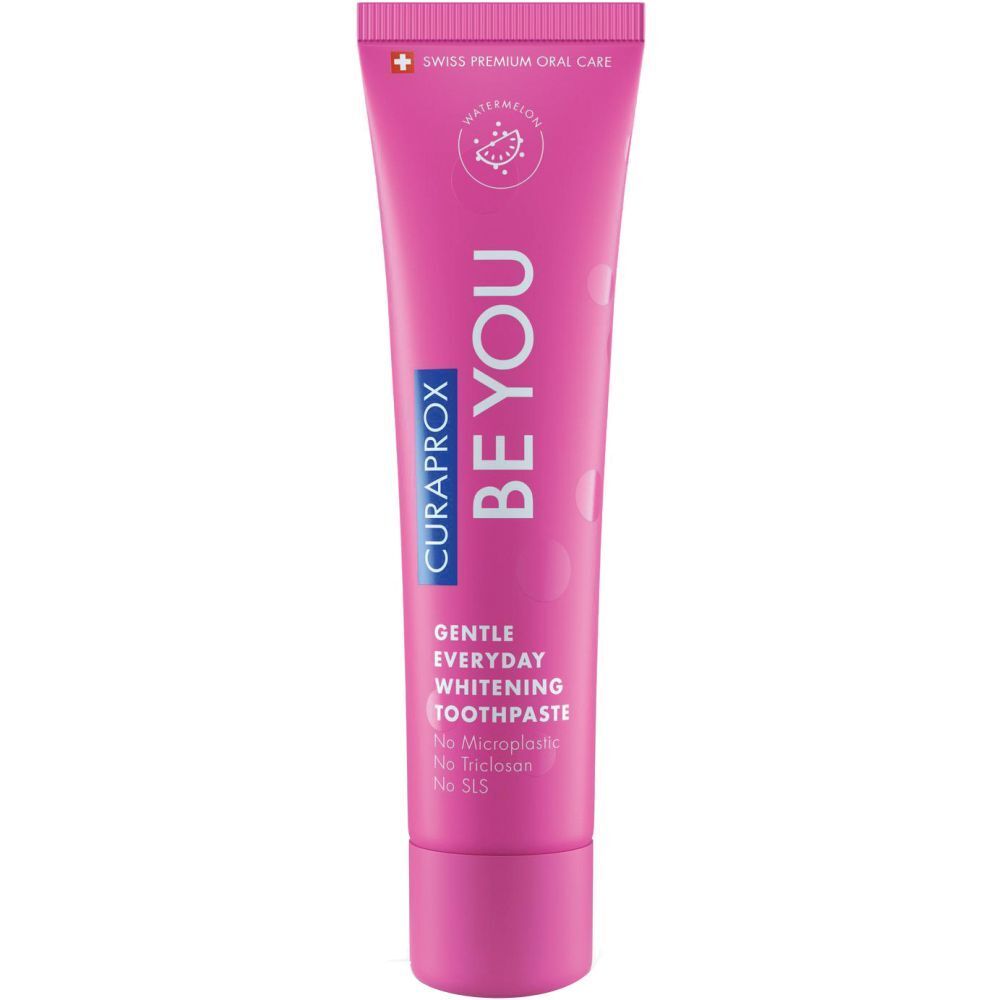 Tubo di dentifricio rosa con testo bianco. CURAPROX BE YOU, Gentle Everyday Whitening Toothpaste. Swiss Premium Oral Care.