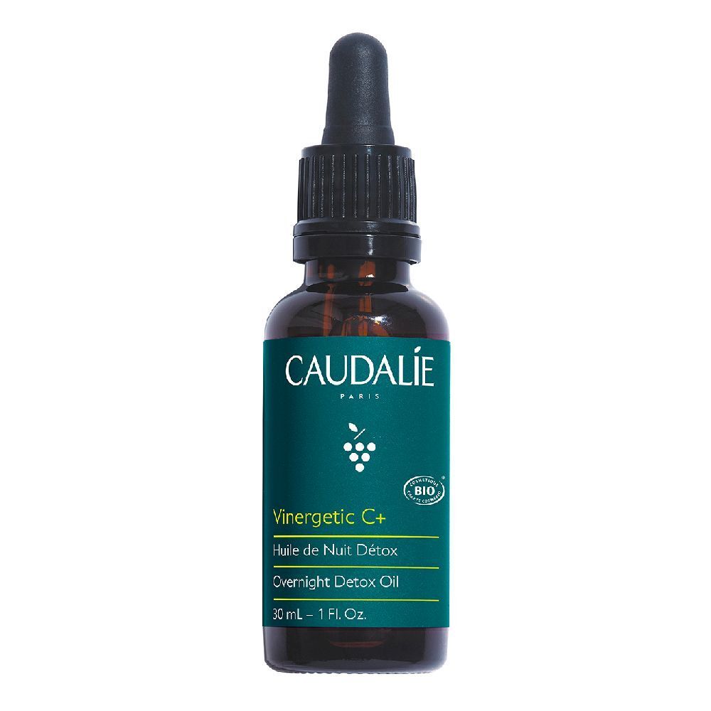 Flacone di vetro marrone con tappo nero e pipetta. Scritta Caudalie, Vinergetic C+, Huile de Nuit Détox, Overnight Detox Oil.
