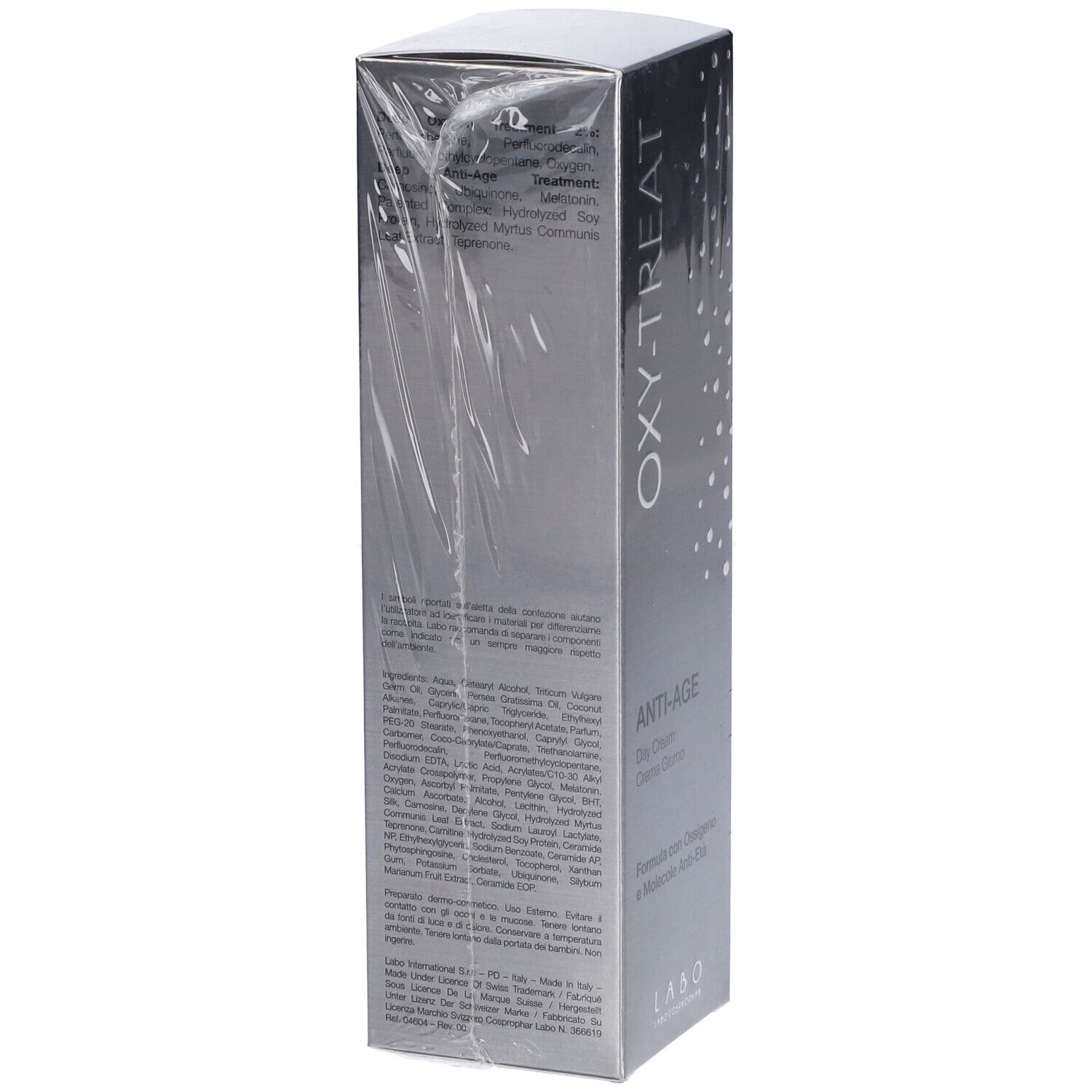 Retro scatola "OXY-TREAT ANTI-AGE Day Cream". Testo multilingue, ingredienti e logo visibili.