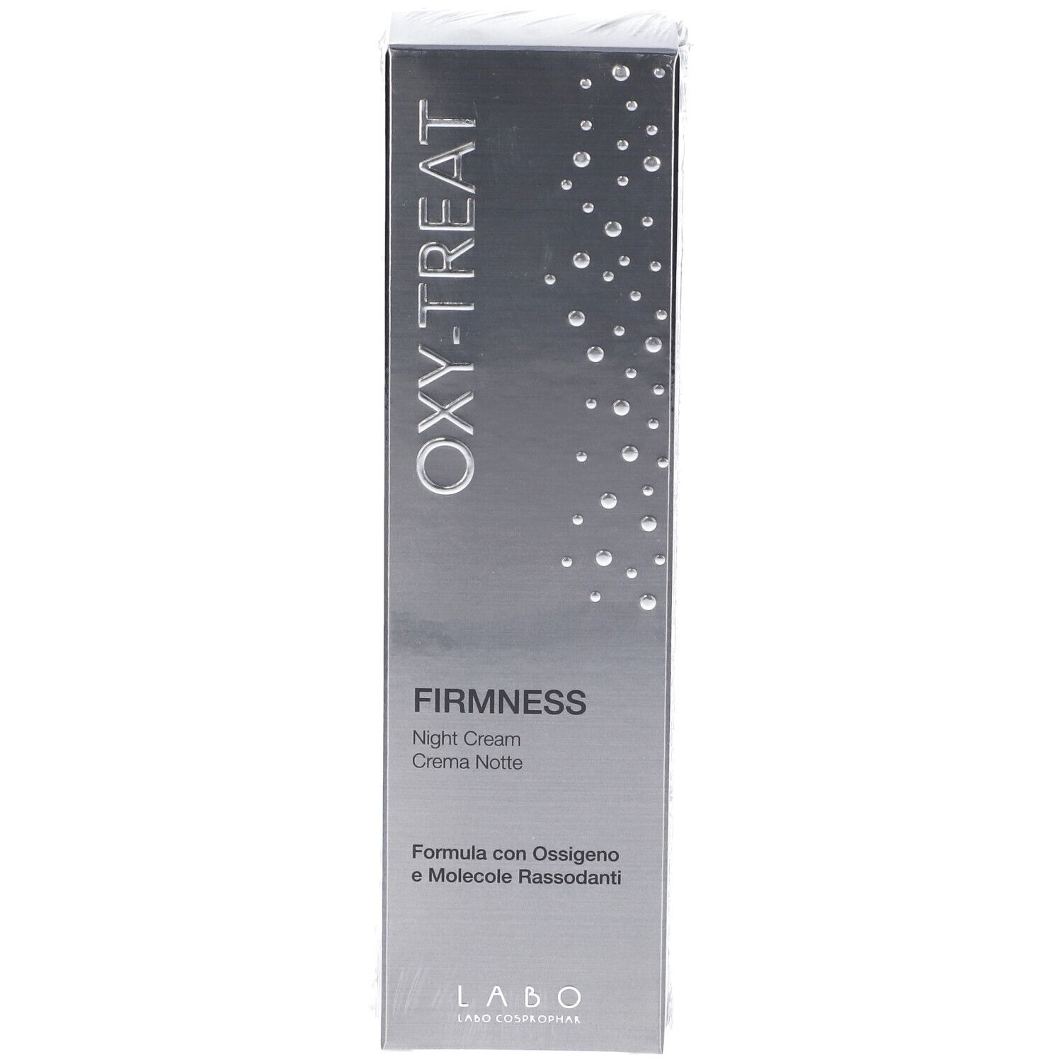 Fronte della confezione della crema notte Oxy-Treat Firmness. Scatola argentata con nome e testo del prodotto.