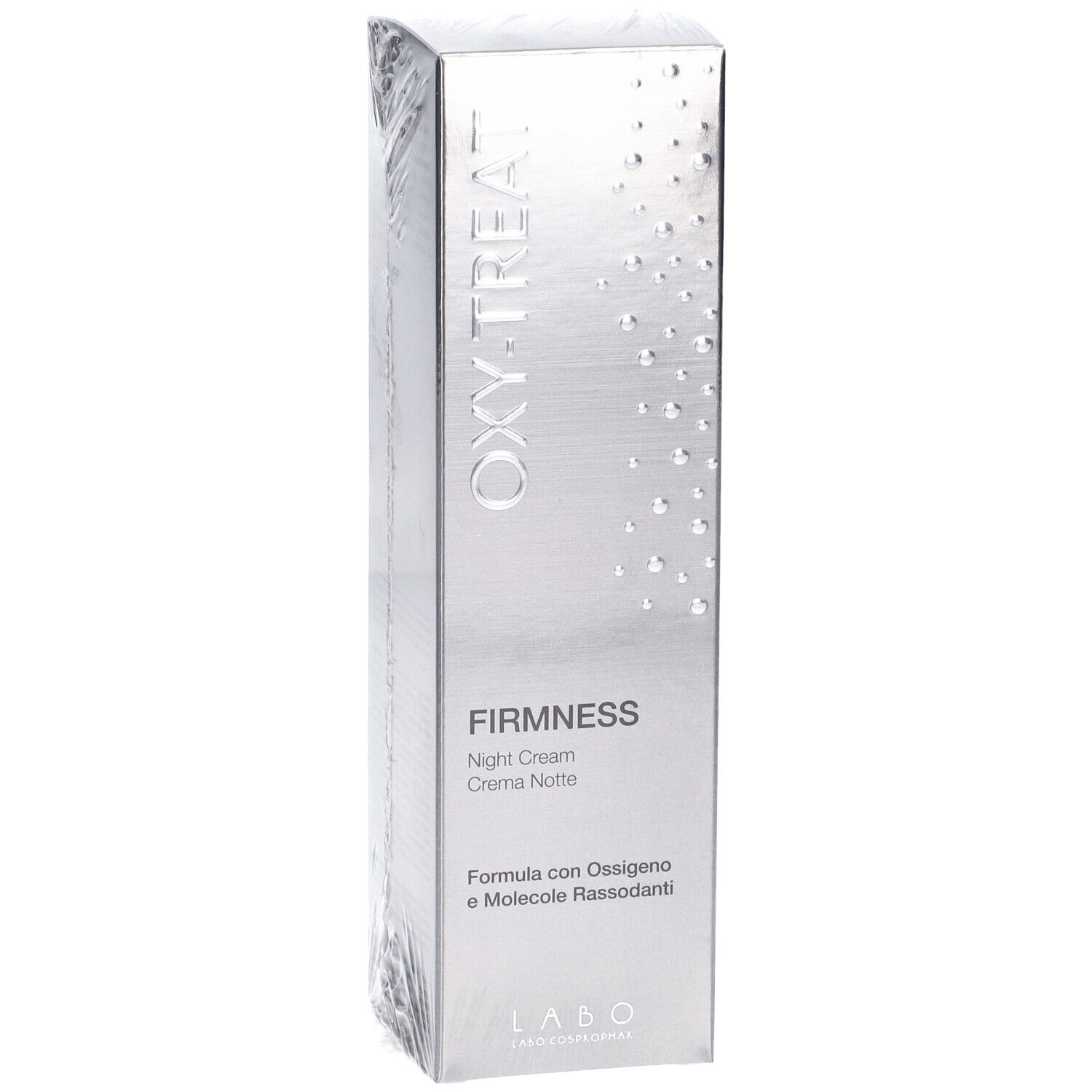 Fronte della confezione della crema notte Oxy-Treat Firmness. Scatola argentata con nome e testo del prodotto.