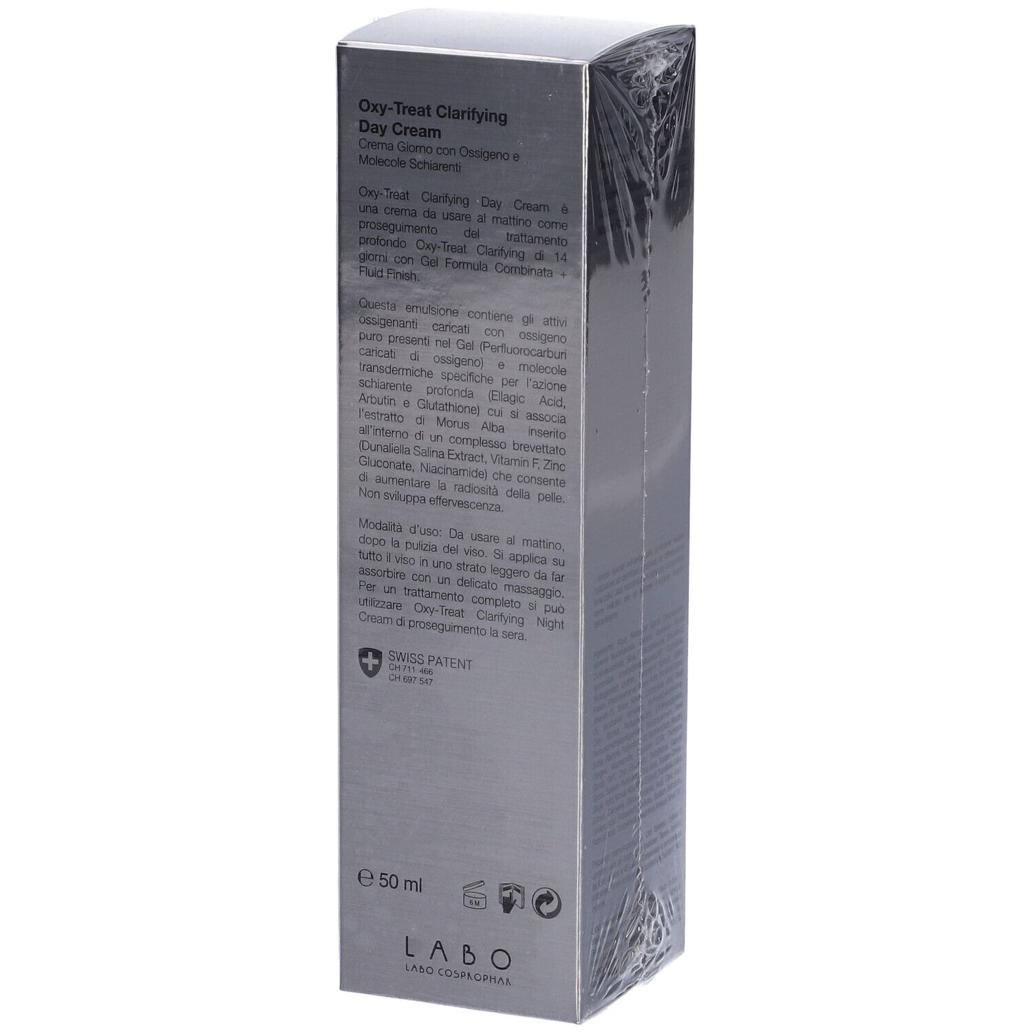 Scatola in film. Scritta OXY-TREAT, CLARIFYING Day Cream, formula con ossigeno e molecole schiarenti. LABO.