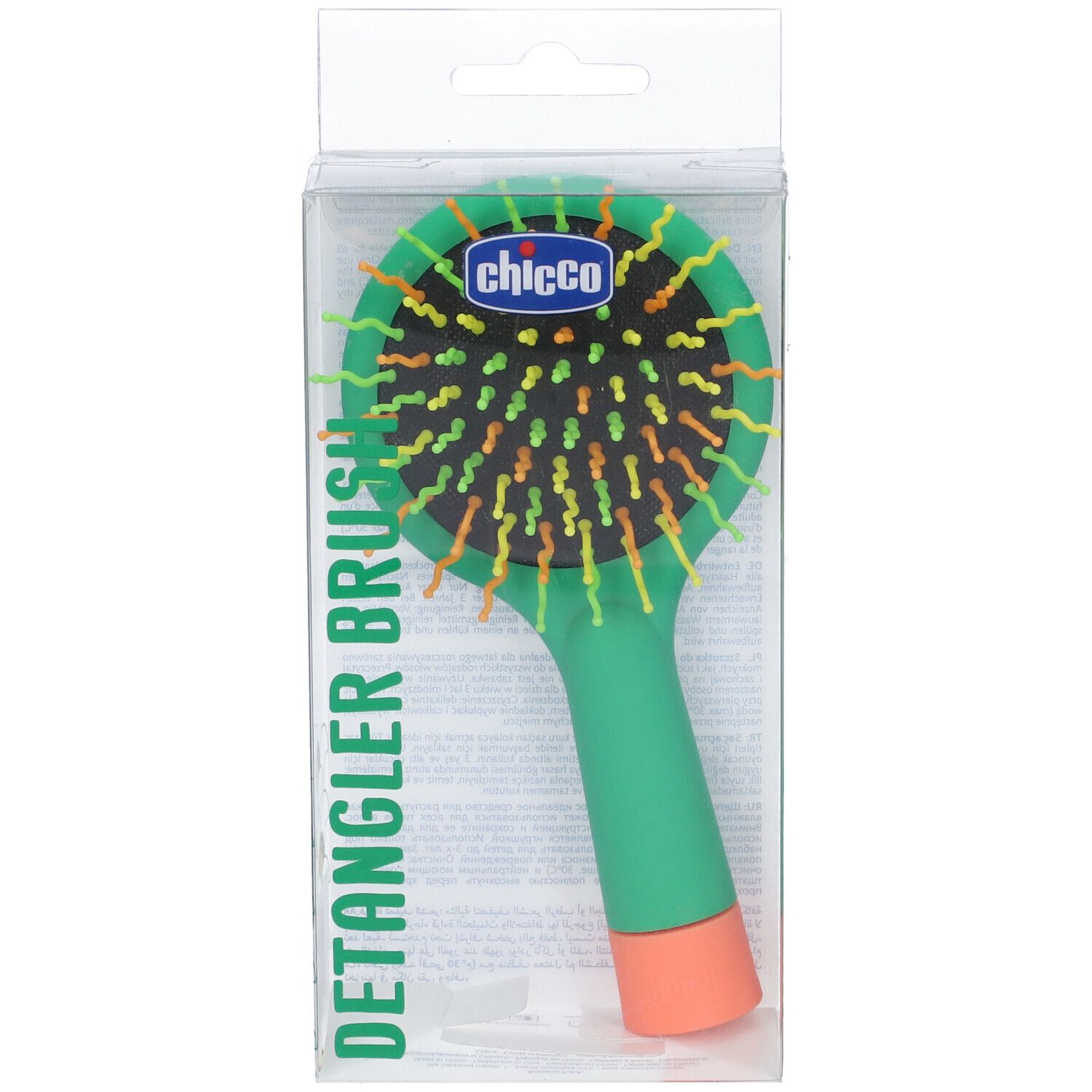 Spazzola verde con setole arancioni e gialle. In confezione trasparente. Marchio Chicco.