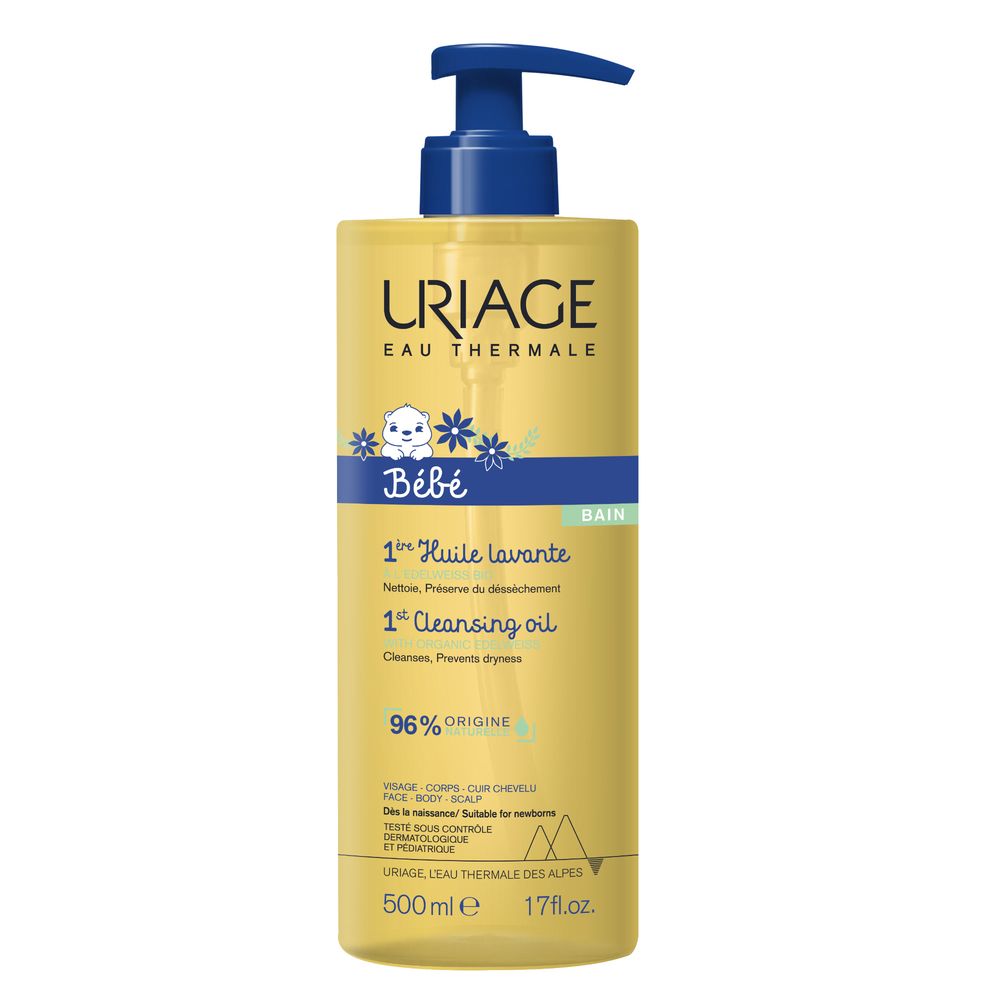 Uriage Bébé Olio Detergente Lenitivo. Flacone giallo con dosatore blu. Testo e logo.