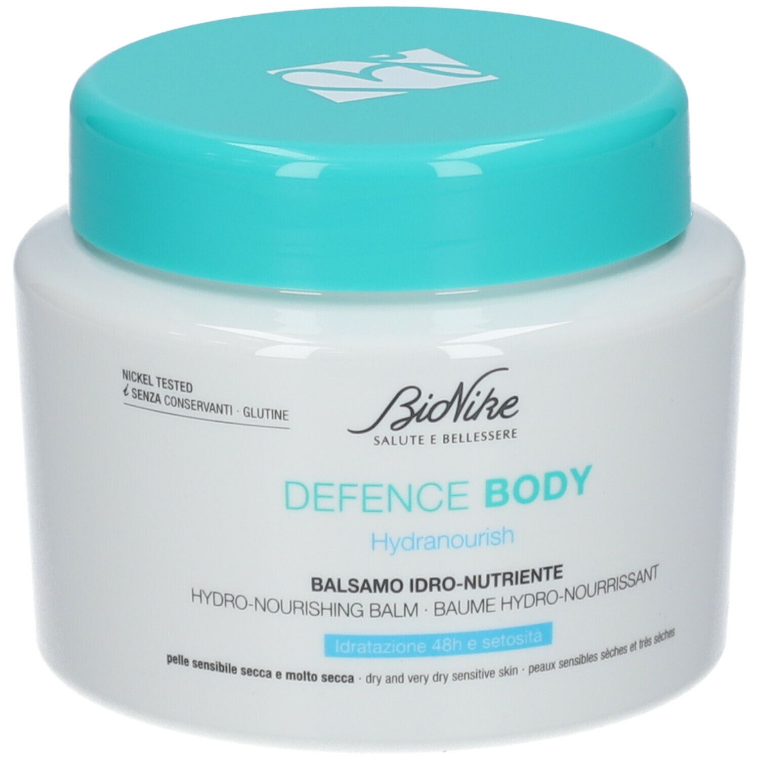 Vaso bianco con coperchio turchese. Scritta: Bionike DEFENCE BODY Hydranourish. Nickel Tested.