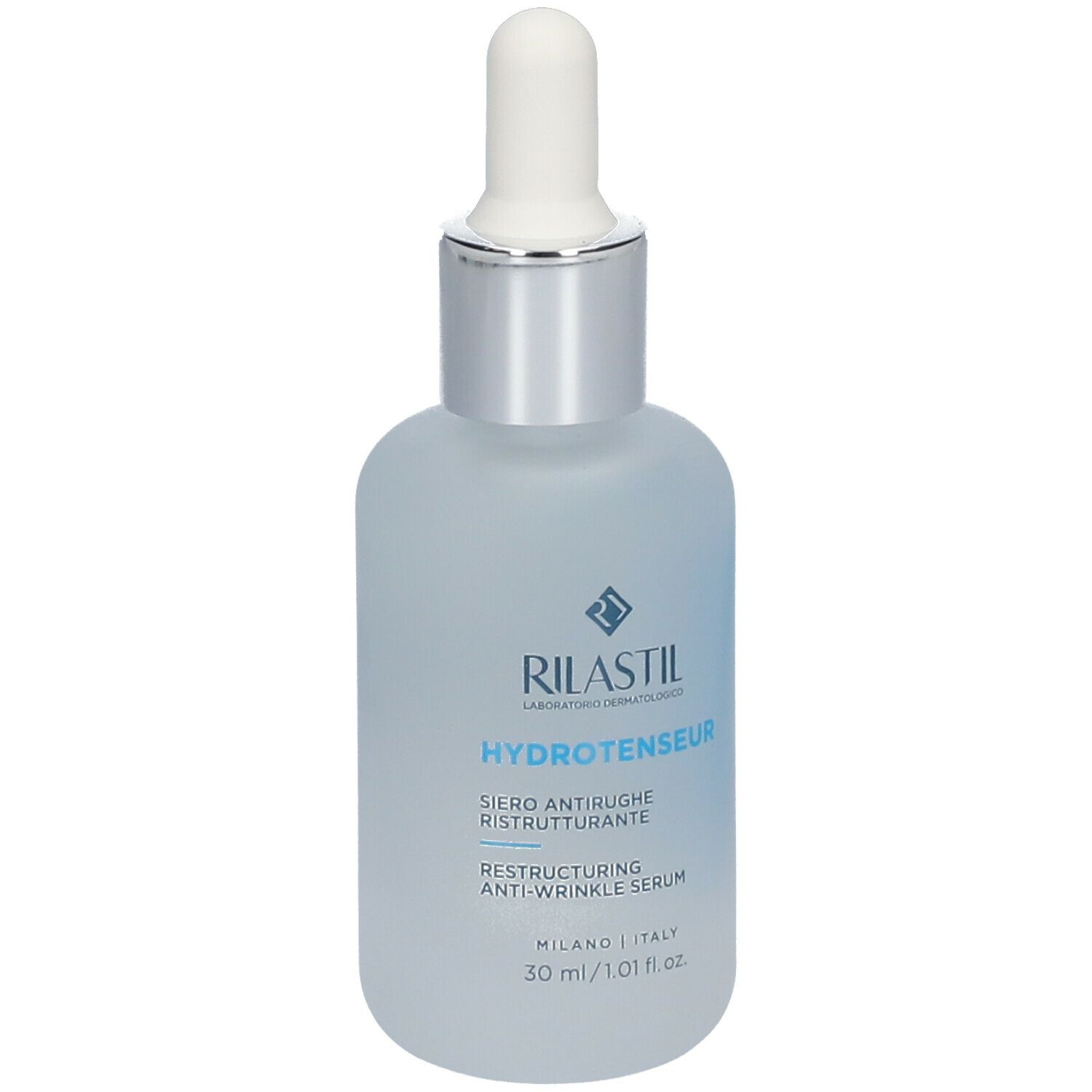 Siero Rilastil Hydrotenseur. Flacone con pipetta. Flacone in vetro blu chiaro opaco. Tappo argentato. Nome del prodotto e logo.