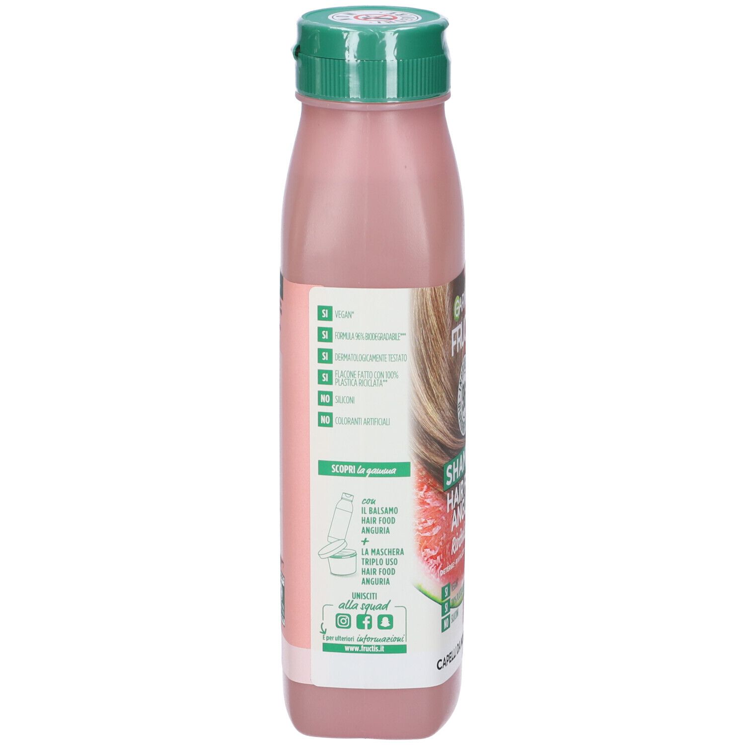 Retro di un flacone di shampoo rosa con tappo verde. Testo: Garnier Fructis, Shampoo Hair Food Anguria. Informazioni sugli ingredienti e il riciclo.