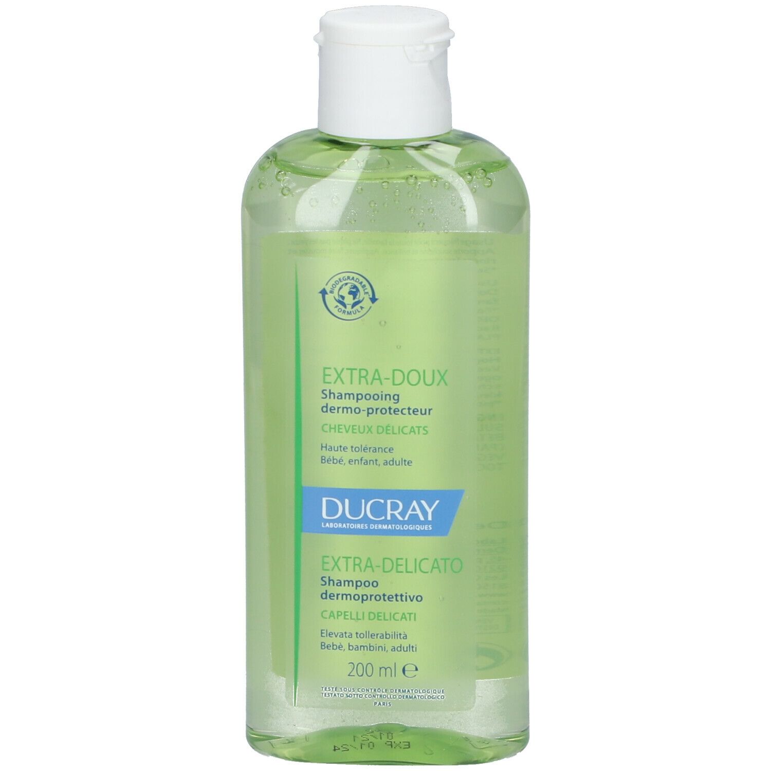 Flacone di shampoo verde con tappo bianco. Testo: EXTRA-DOUX, Ducray, 200 ml. Per capelli delicati. Simbolo di riciclo.