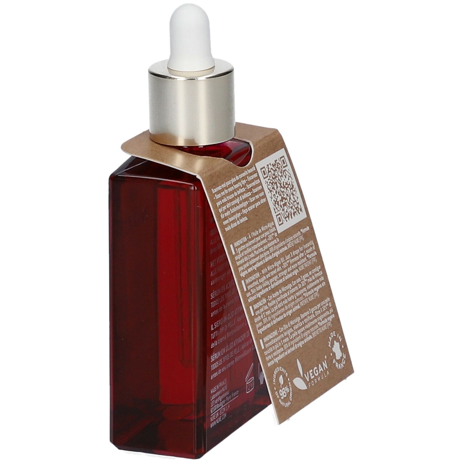 Flacone di siero rosso con pipetta ed etichetta. Etichetta con QR code e testo. Logo vegan.