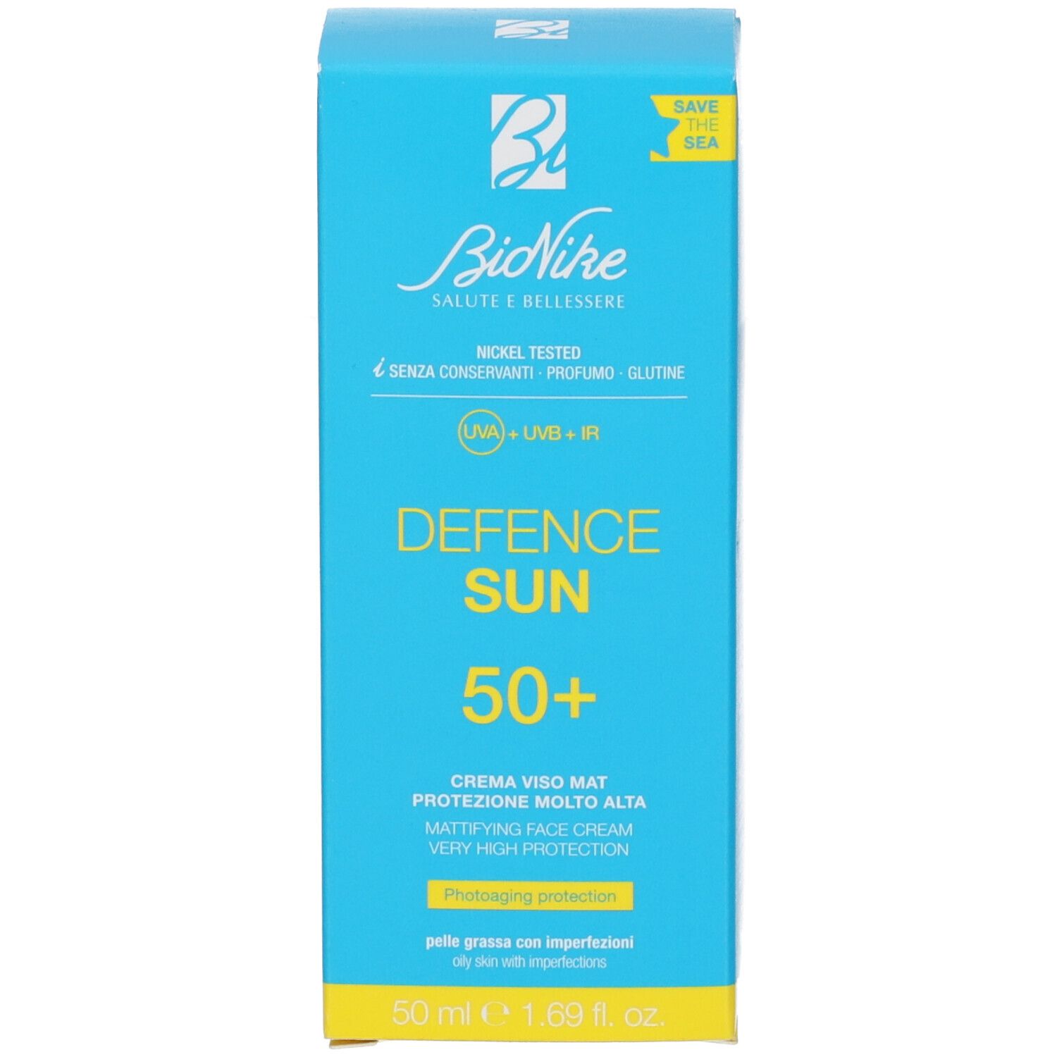 Blaue Schachtel. Aufschrift: Defence Sun 50+. Text: Crema Viso Mat, protezione molto alta. Marke: BioNike. 50 ml.
