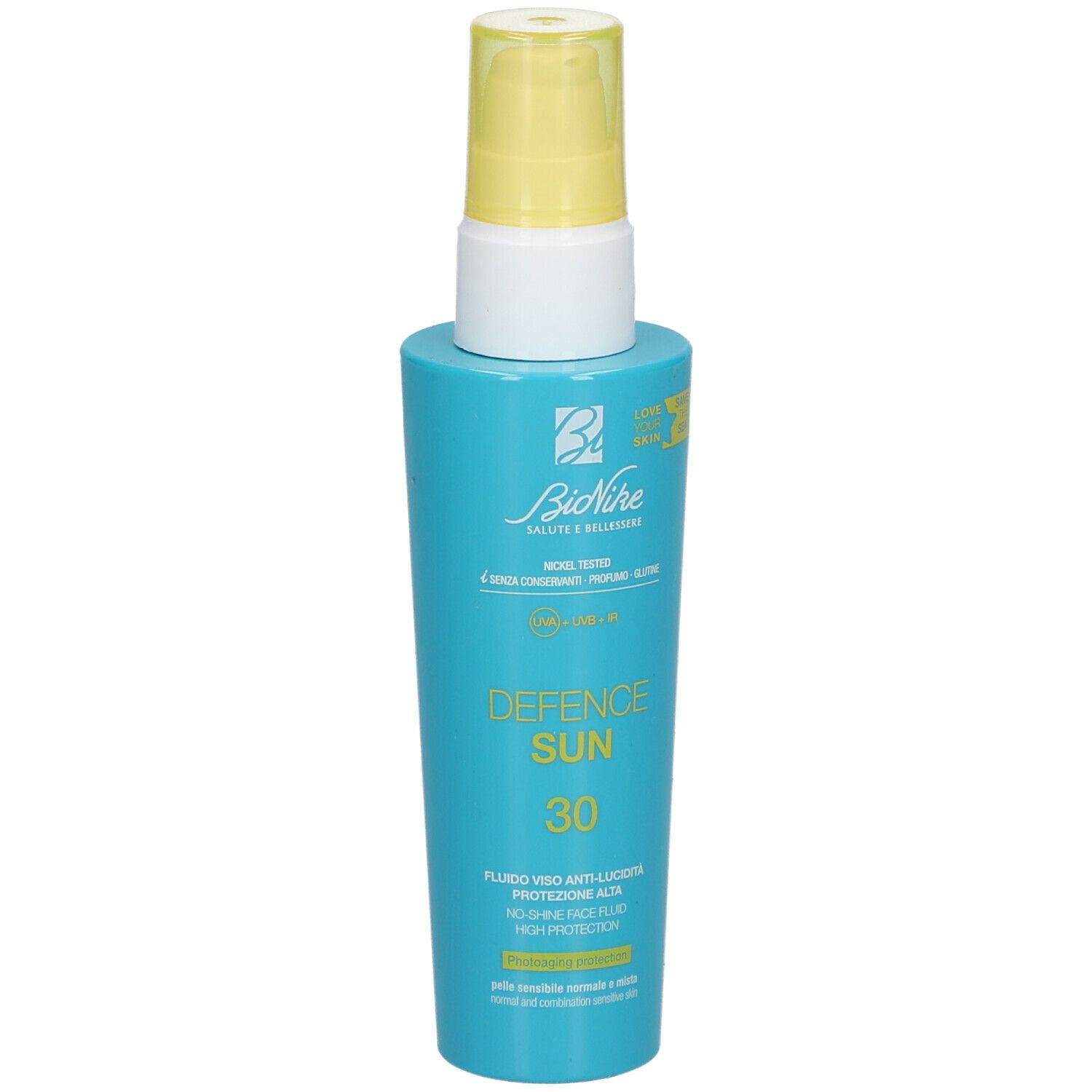 Flacone turchese con erogatore giallo. Scritta: Defence Sun 30, Bionike.
