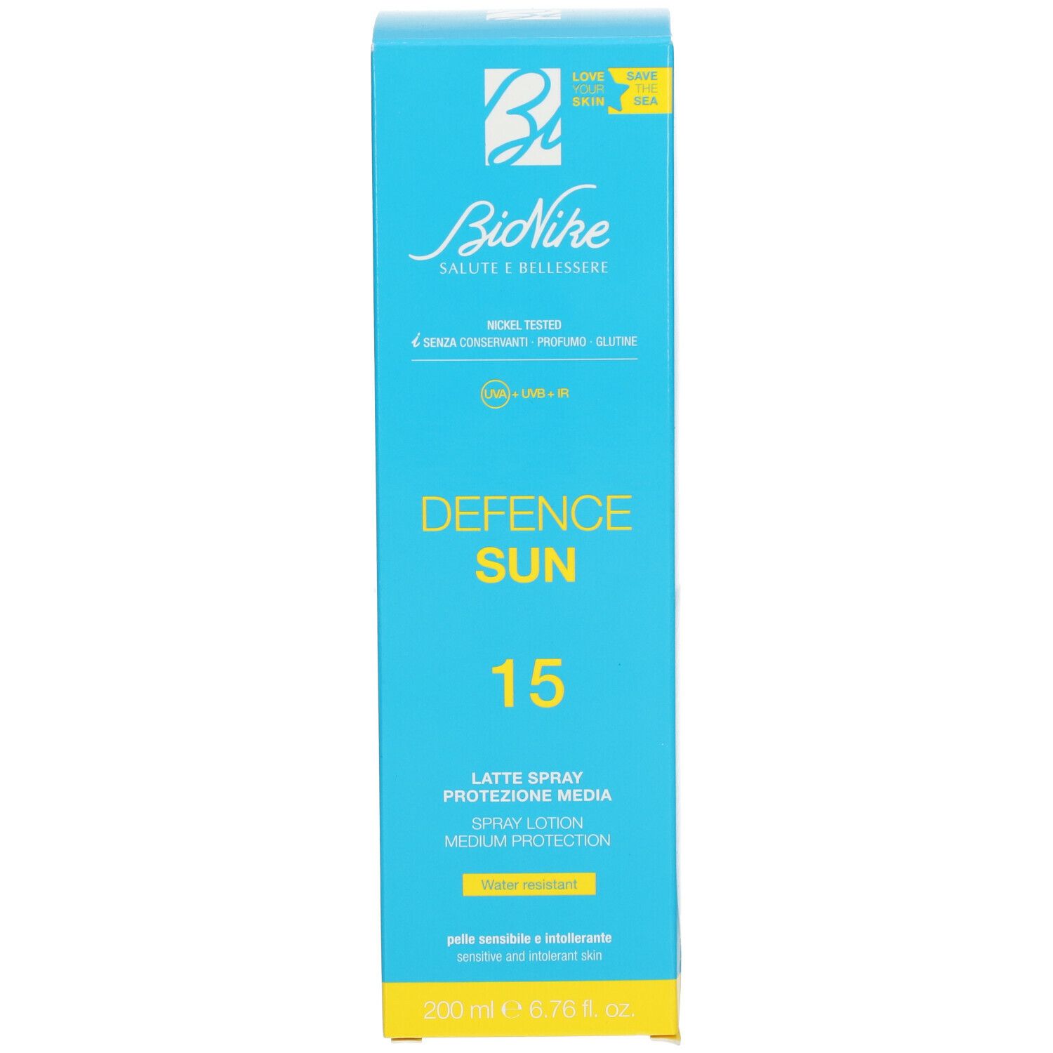 Scatola con scritta: Defence Sun 15, Latte Spray, protezione SPF 15. 200 ml.