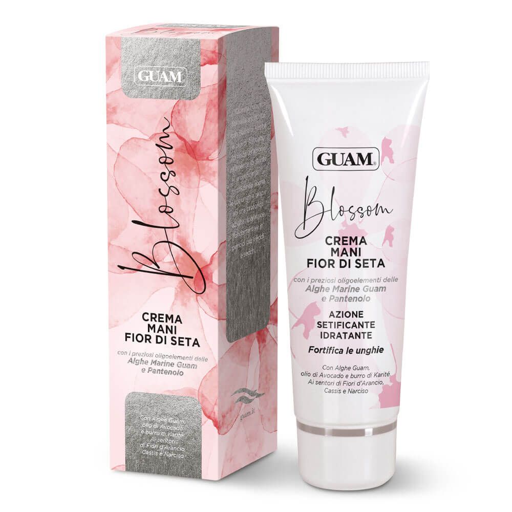Crema mani GUAM Blossom e confezione. Motivi floreali rosa. Testo: Crema Mani Fior Di Seta, Azione Setificante Idratante.