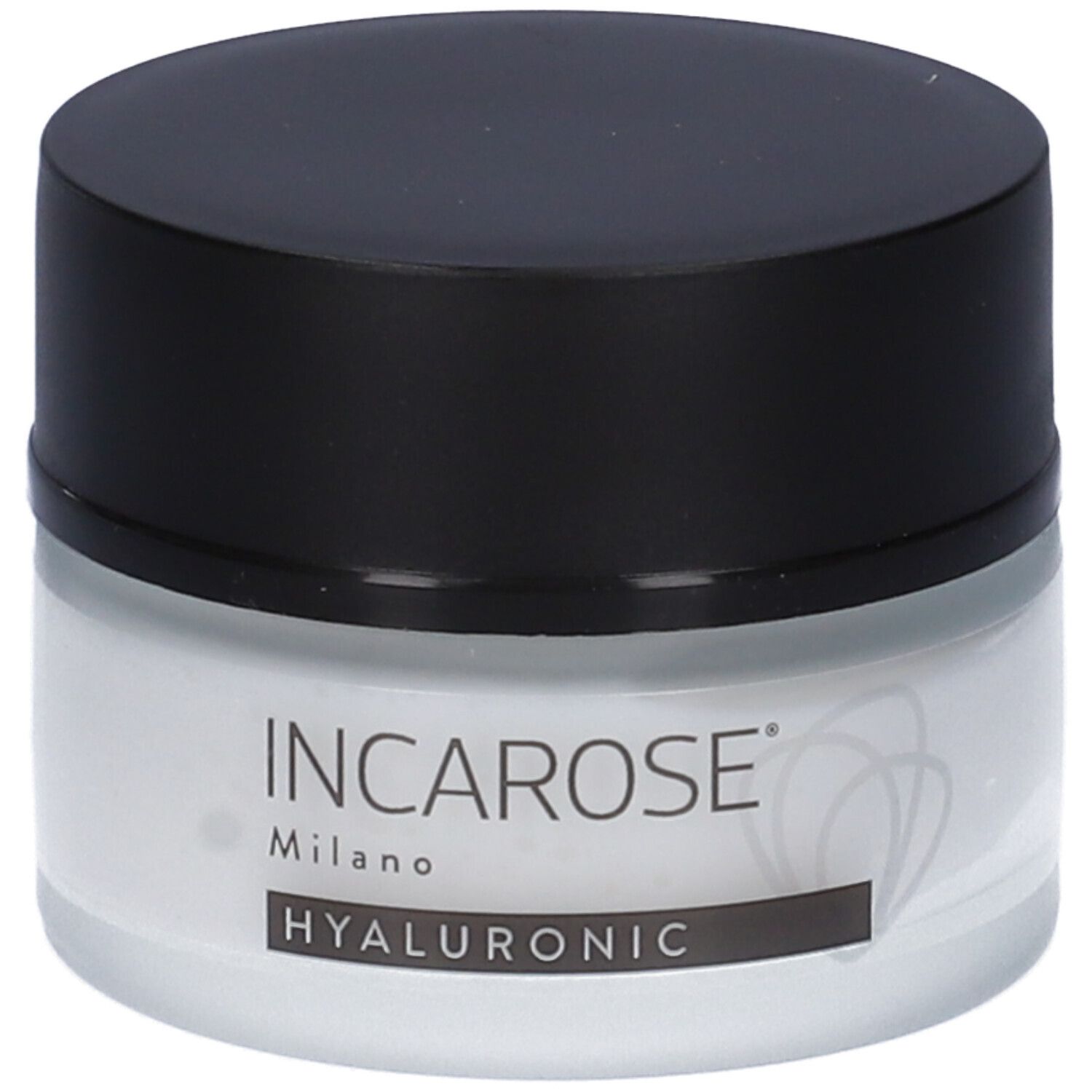 Primo piano di un vasetto di crema con coperchio nero. Sul vasetto si legge "INCAROSE Milano HYALURONIC".