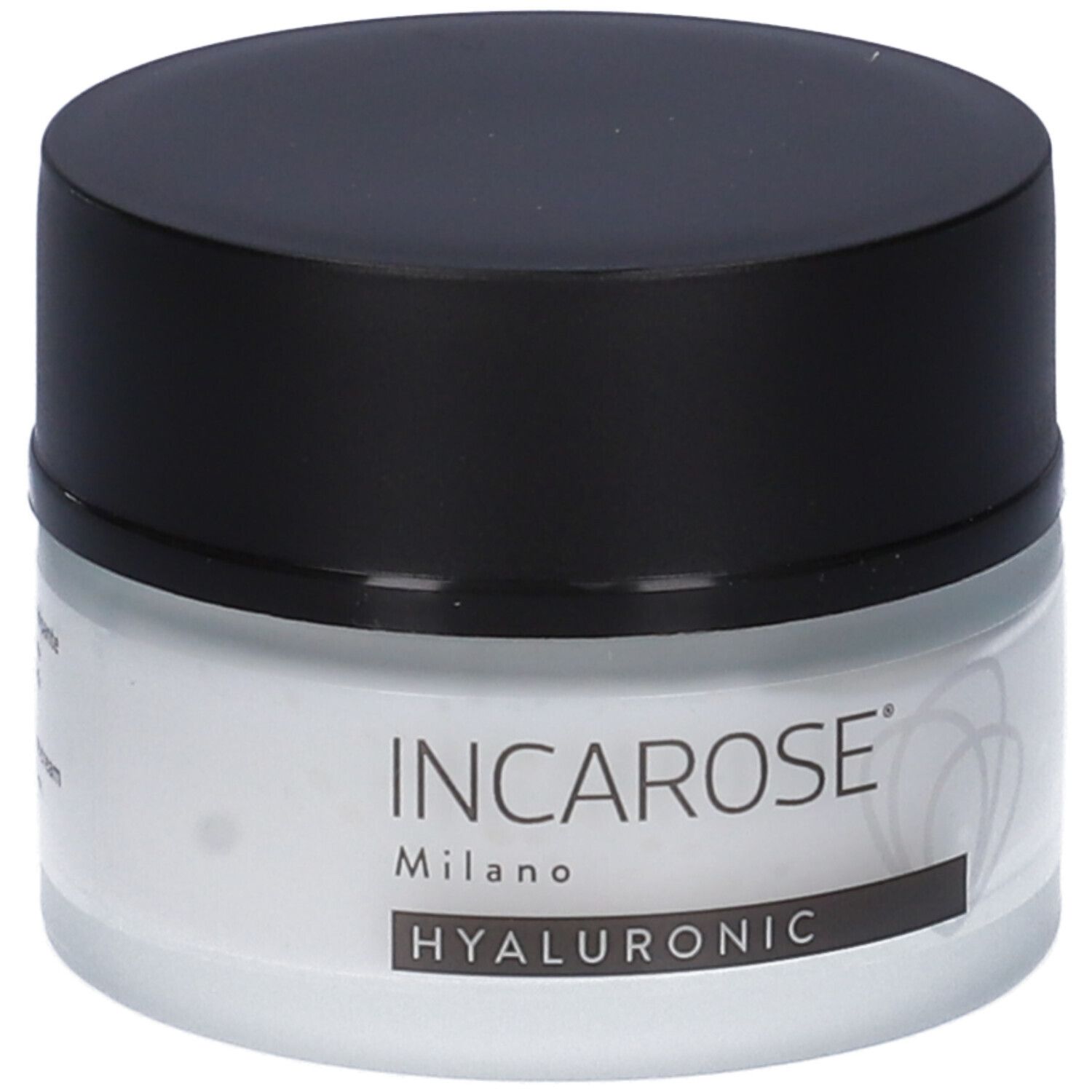 Primo piano di un vasetto di crema con coperchio nero. Sul vasetto si legge "INCAROSE Milano HYALURONIC".