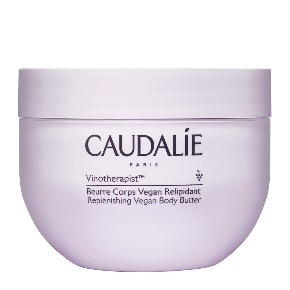 Vaso bianco con coperchio. Scritta: CAUDALIE PARIS, Vinotherapist, Beurre Corps Vegan Relipidant.