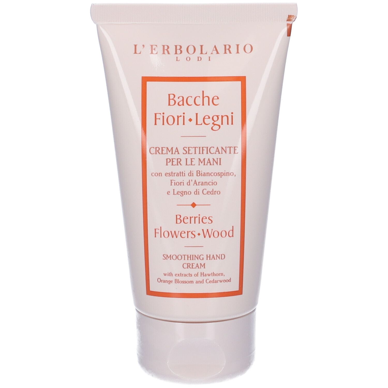 Tubo di crema con testo. Scritta: Bacche Fiori Legni, Creme Setificante, Berries Flowers Wood. Sfondo bianco.