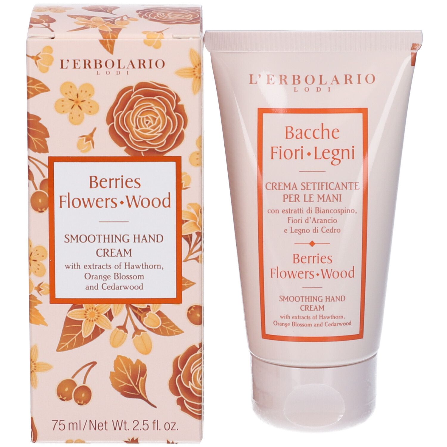 Tubo di crema e scatola. Testo: Bacche Fiori Legni, Berries Flowers Wood. Motivo floreale. Sfondo bianco.