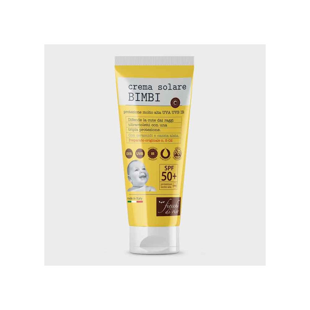 Tubo giallo di crema solare per bambini. Testo: 'Crema Solare Bimbi', SPF 50+. Logo: Fiocchi di Riso.