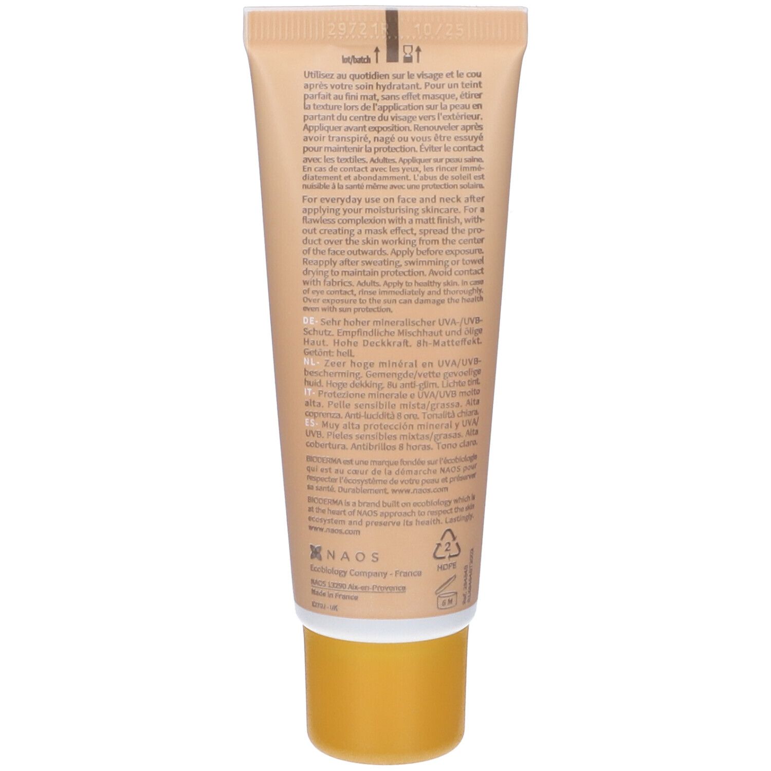 Retro del tubo di crema con testo. Tappo giallo. Marchio NAOS.
