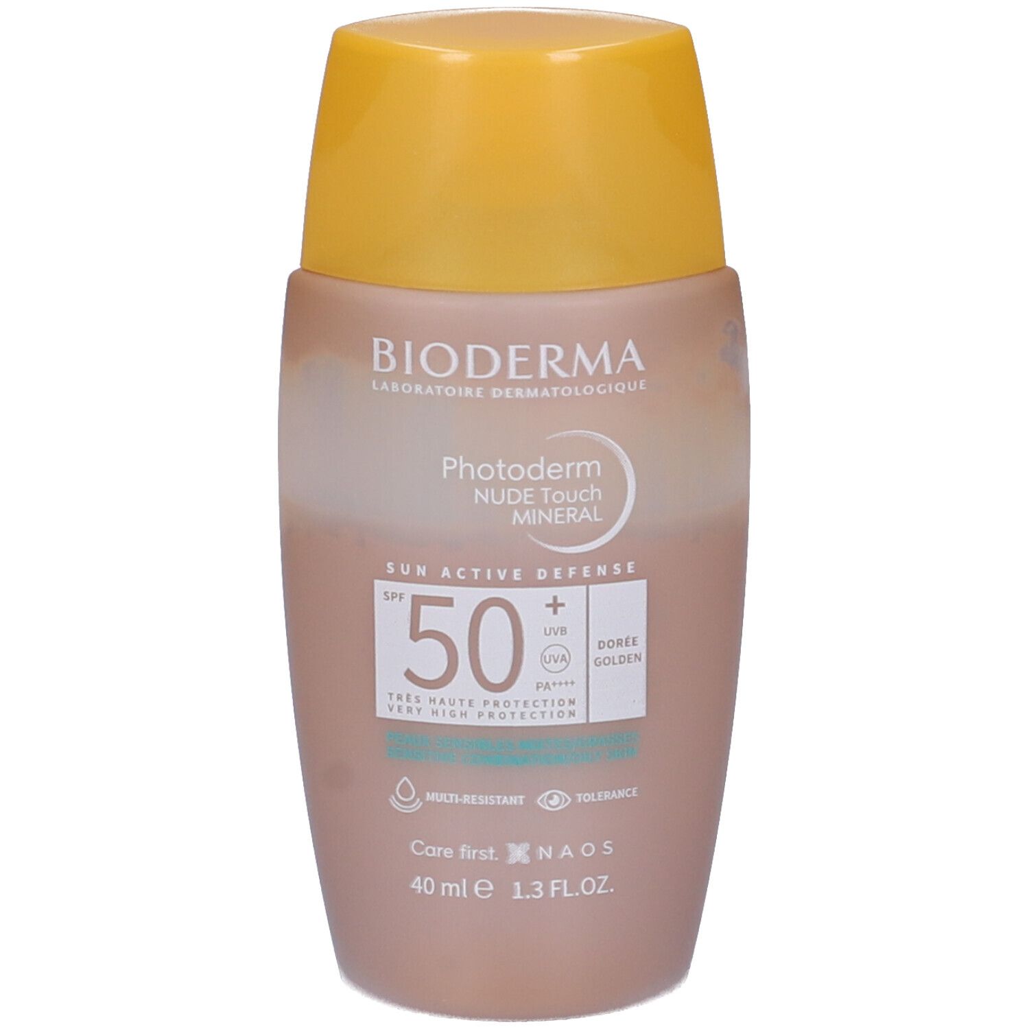 Flacone di crema solare con tappo giallo. Scritta: Bioderma, Photoderm Nude Touch Mineral SPF50+. Tonalità Dorata. 40 ml.