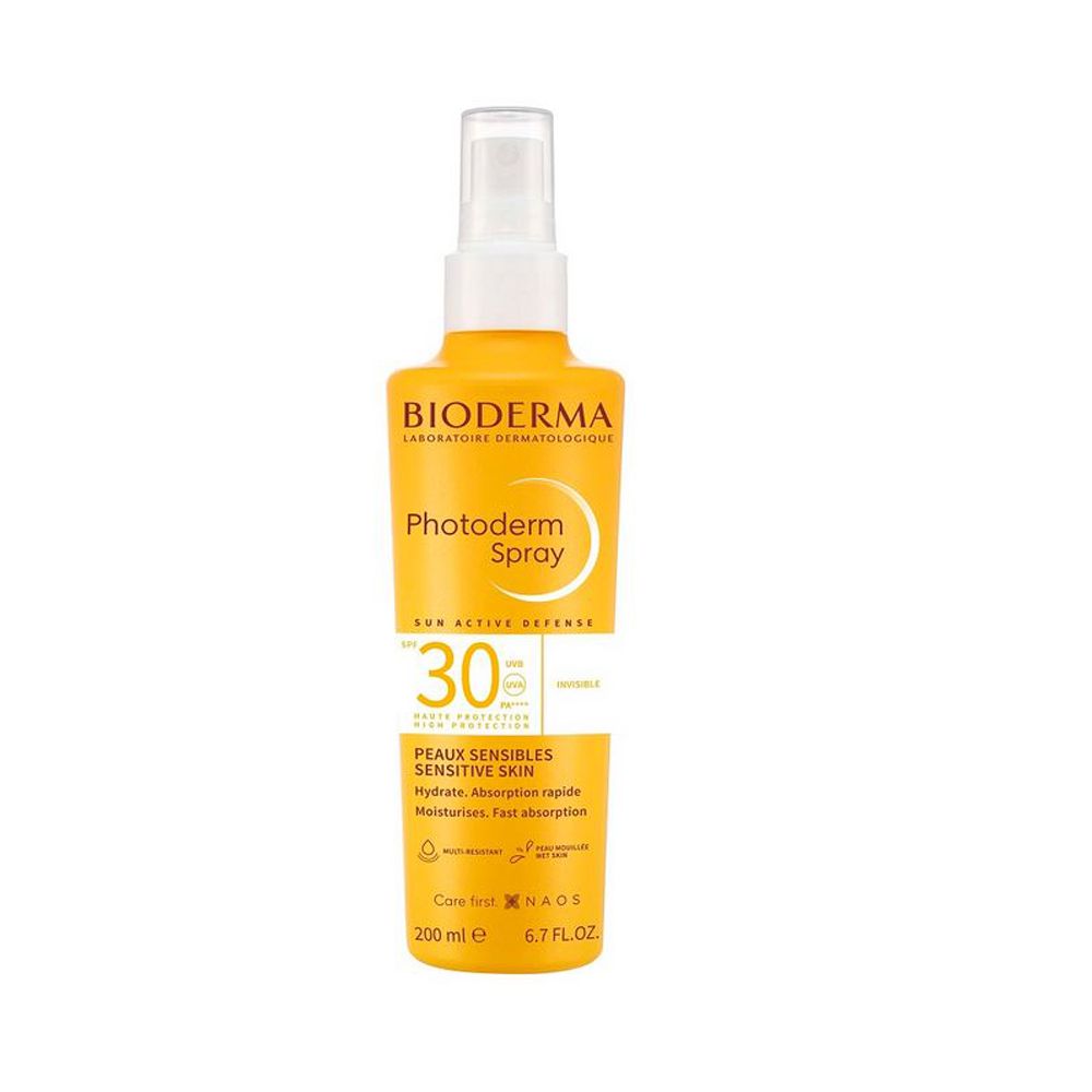 Flacone spray giallo con erogatore bianco. Scritta: BIODERMA Photoderm Spray SPF30. Per pelli sensibili.
