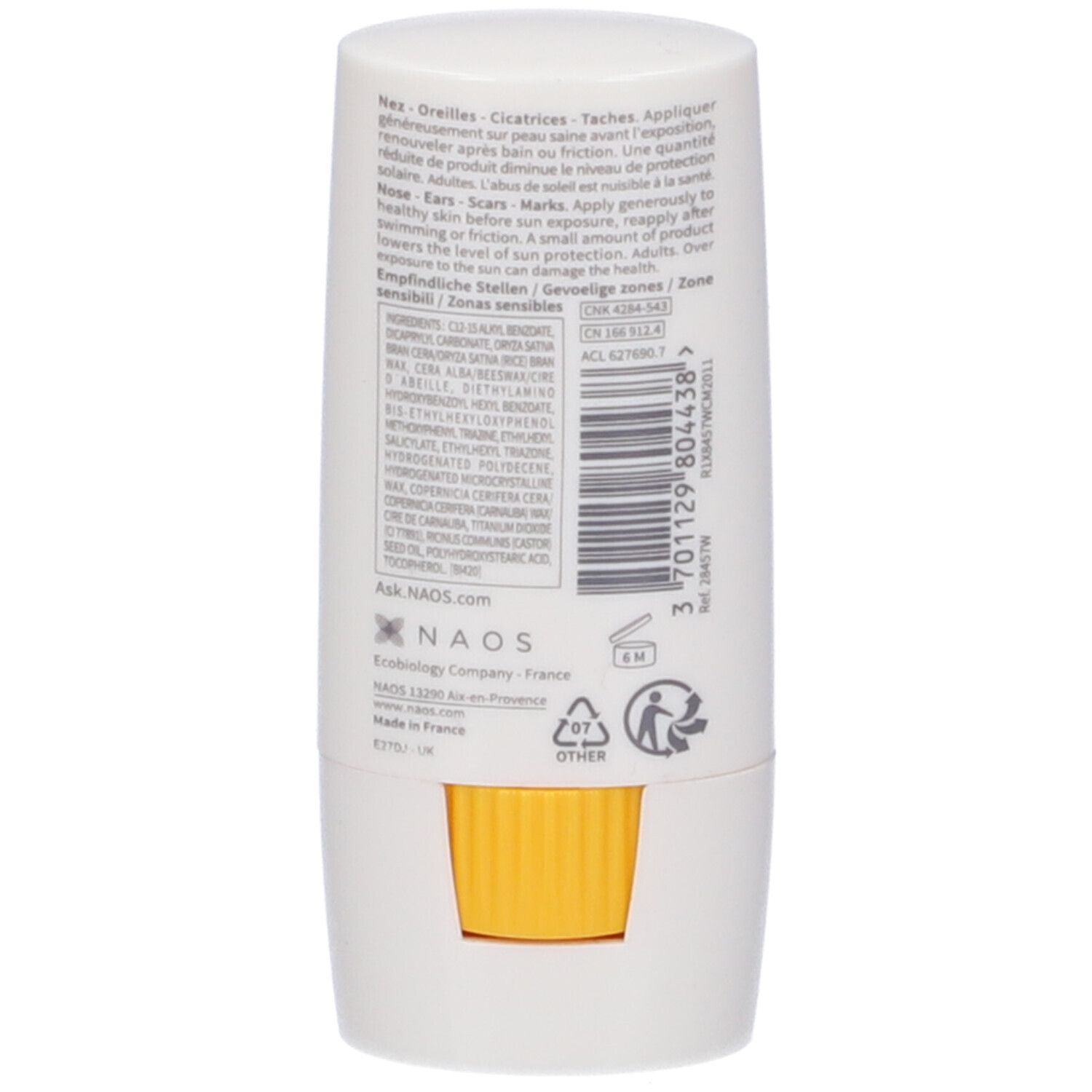 Retro dello stick solare bianco. Contiene testo e codice a barre. Meccanismo rotante giallo visibile.