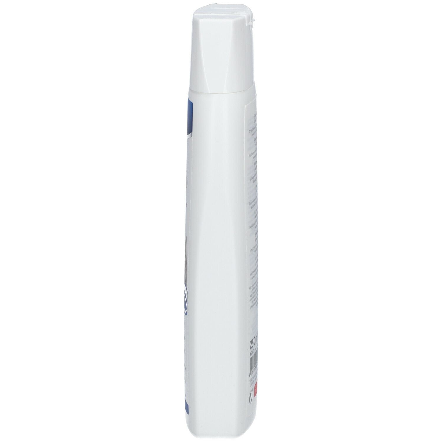 Flacone di shampoo bianco, vista laterale. Flacone con tappo bianco ed etichetta blu. Testo multilingue.