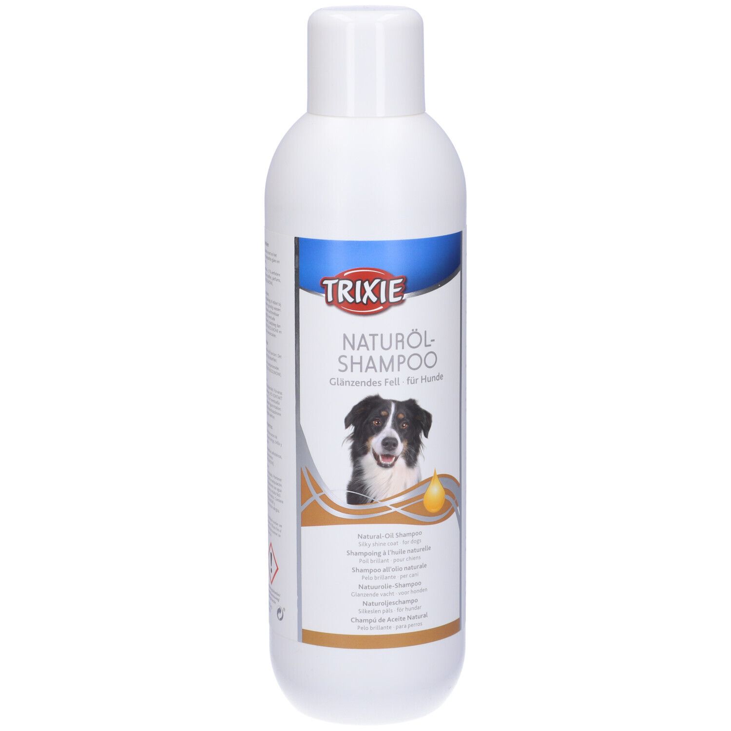 Flacone bianco di shampoo TRIXIE all'olio naturale per cani. Etichetta con foto di cane e nome del prodotto.