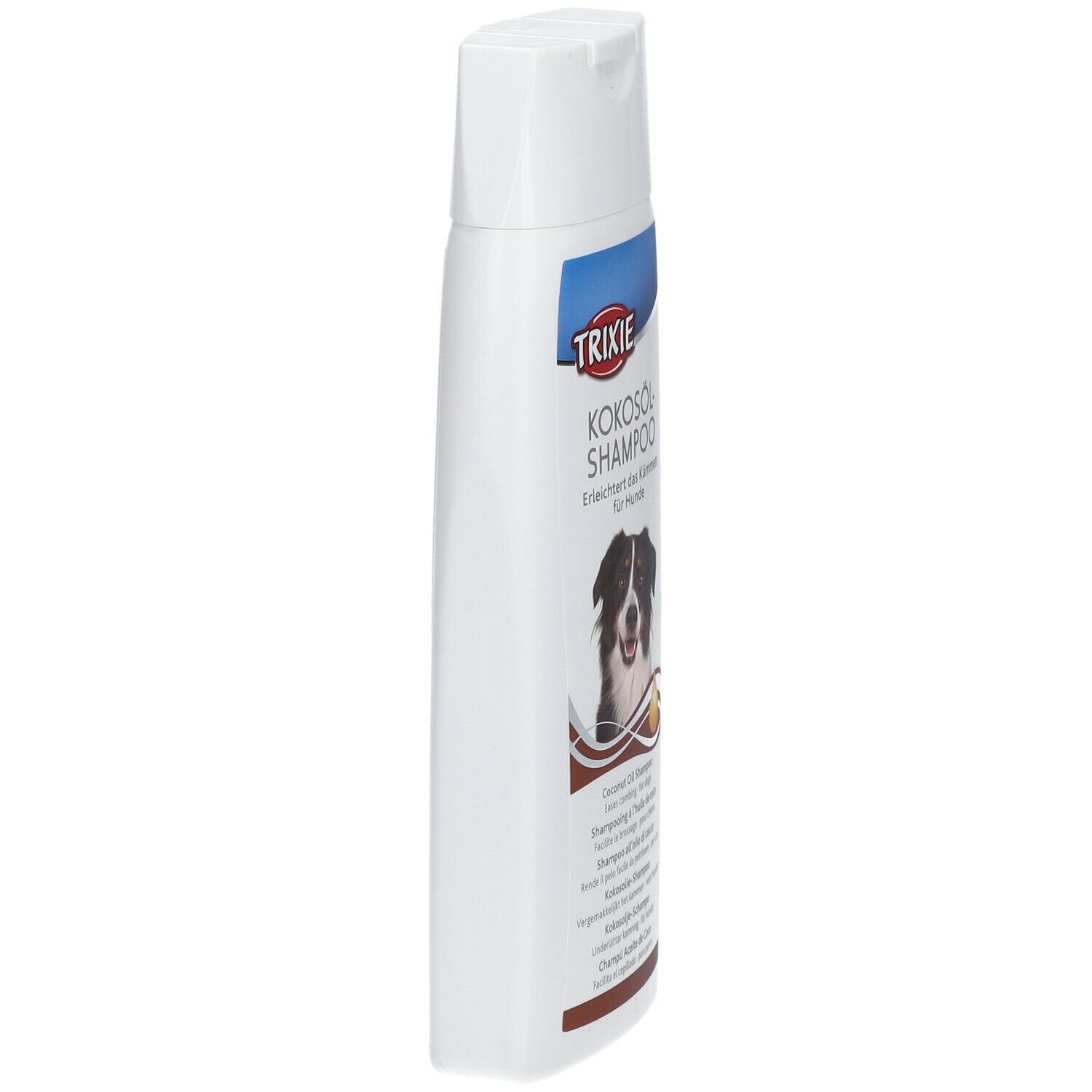 Flacone bianco di shampoo TRIXIE all'olio di cocco per cani. Vista laterale. Nome del prodotto e foto del cane parzialmente visibili. Tappo bianco.