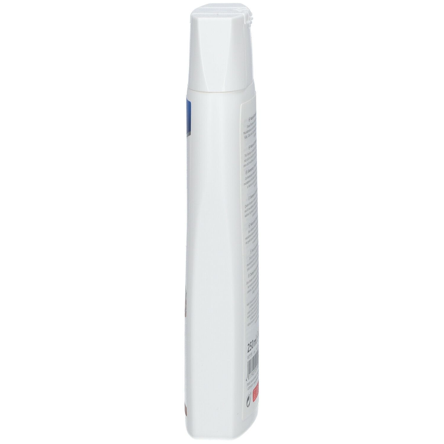 Flacone bianco di shampoo TRIXIE all'olio naturale. Vista laterale. Informazioni sull'etichetta. Tappo bianco.