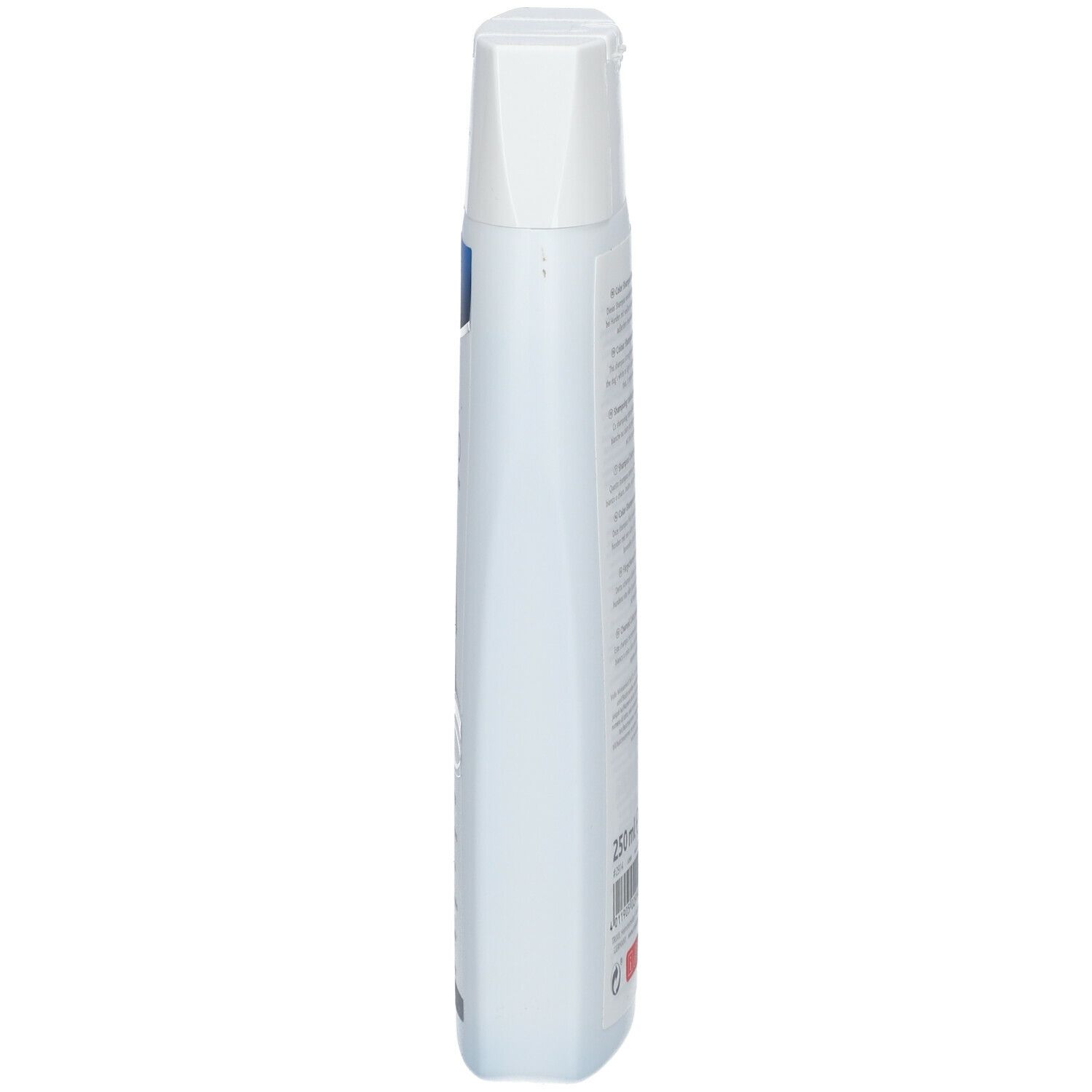 Bottiglia di shampoo TRIXIE Color, bianca. Vista laterale. Forma rettangolare sottile con tappo bianco. 250 ml.